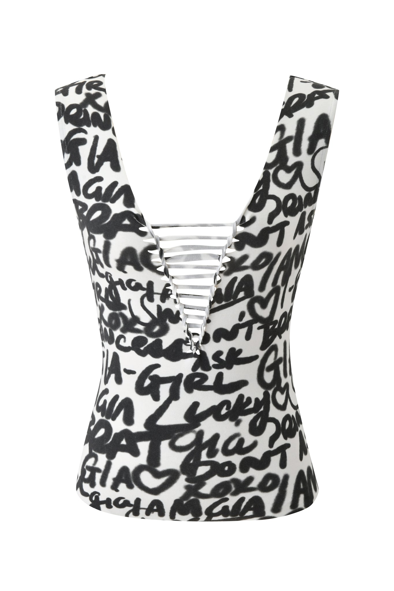 The HONEY MACRAME TOP - WRITING ON THE WALL by I.AM.GIA is a sleeveless white top with a deep V-neckline, macrame details, horizontal chest straps, and features bold black graffiti print with playful heart shapes.