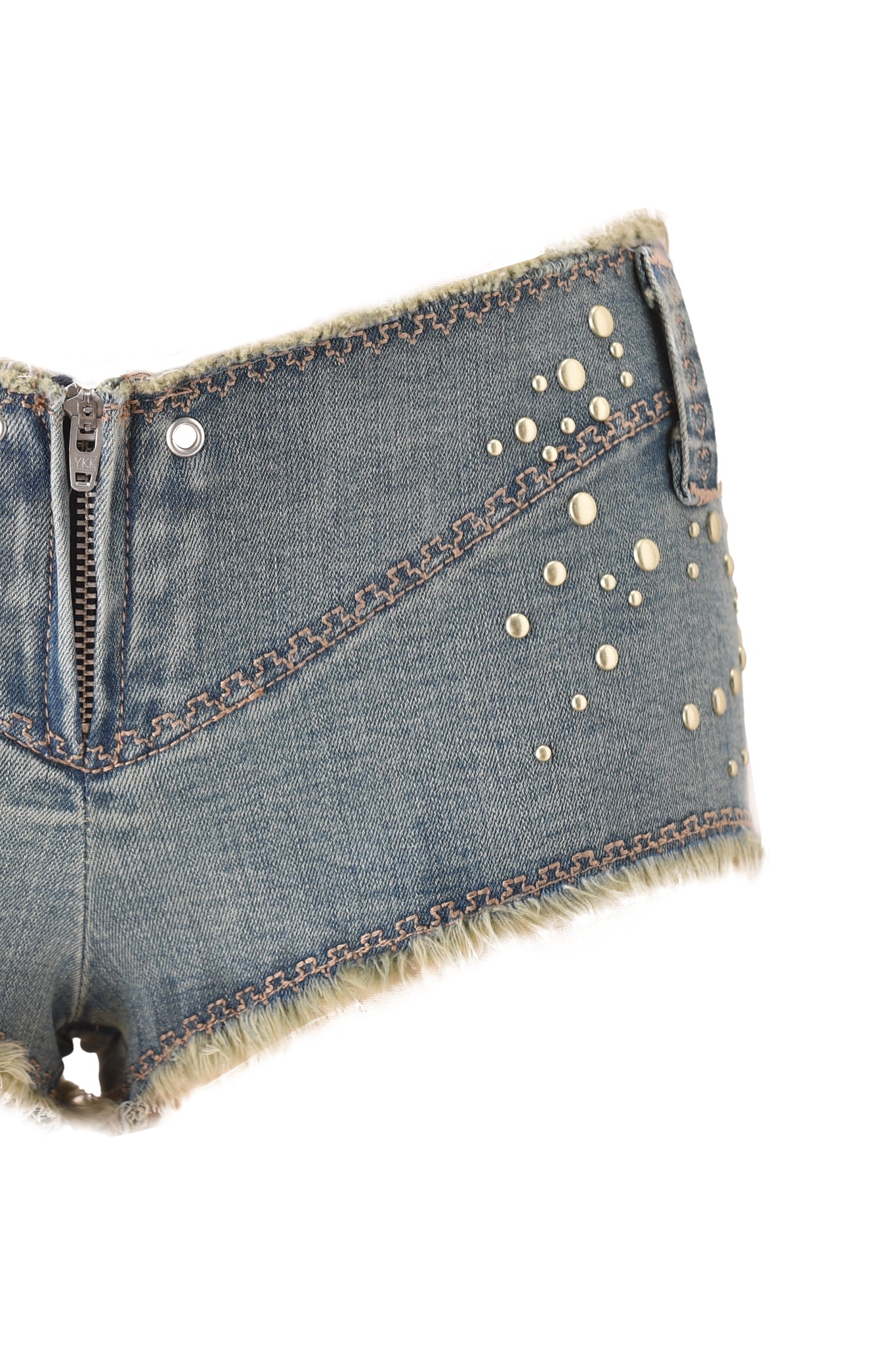 A close-up of the I.AM.GIA VEXA SHORT in vintage blue denim, featuring ultra low-rise fit, front zipper, metal studs, decorative stitching, and faux fur trim on waistband and leg openings, isolated on white background.