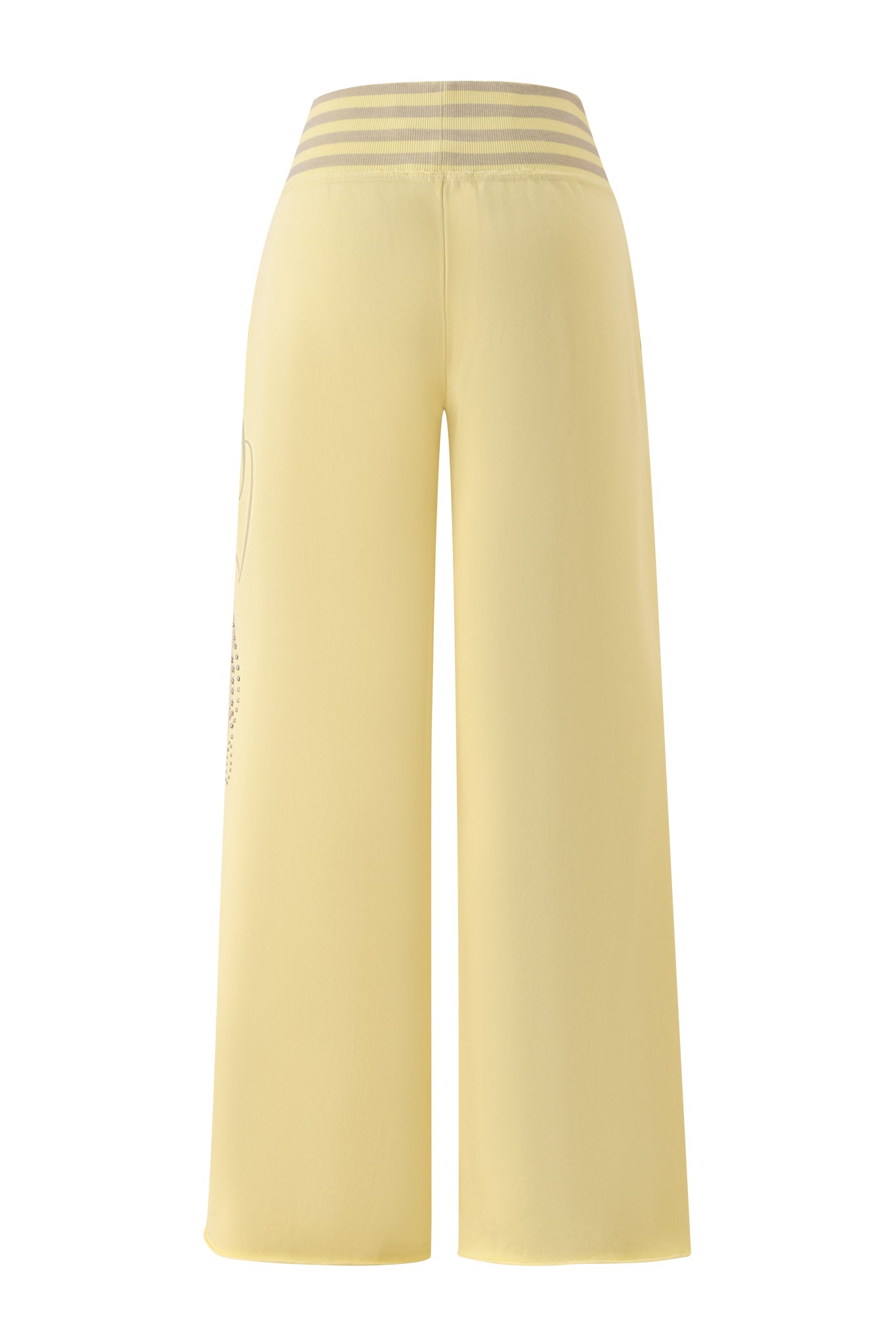 The I.AM.GIA VEDA PANT in yellow features a high-waisted, wide-leg silhouette with gray horizontal stripes on the waistband, shown from the back against a white background.