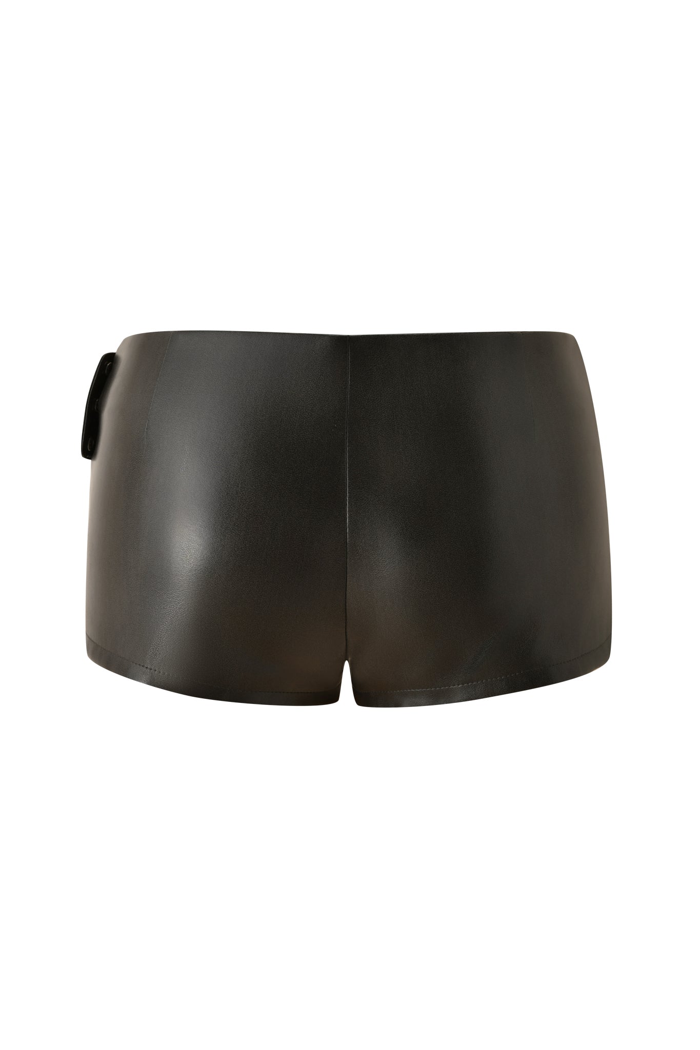 The DASHA SHORTS - GREY by I.AM.GIA are grey faux leather hot shorts seen from the back, showcasing a smooth matte finish and a subtle detail on the left hip. Designed with a low-rise fit and sleek silhouette, these contemporary shorts are perfect for making a bold style statement.