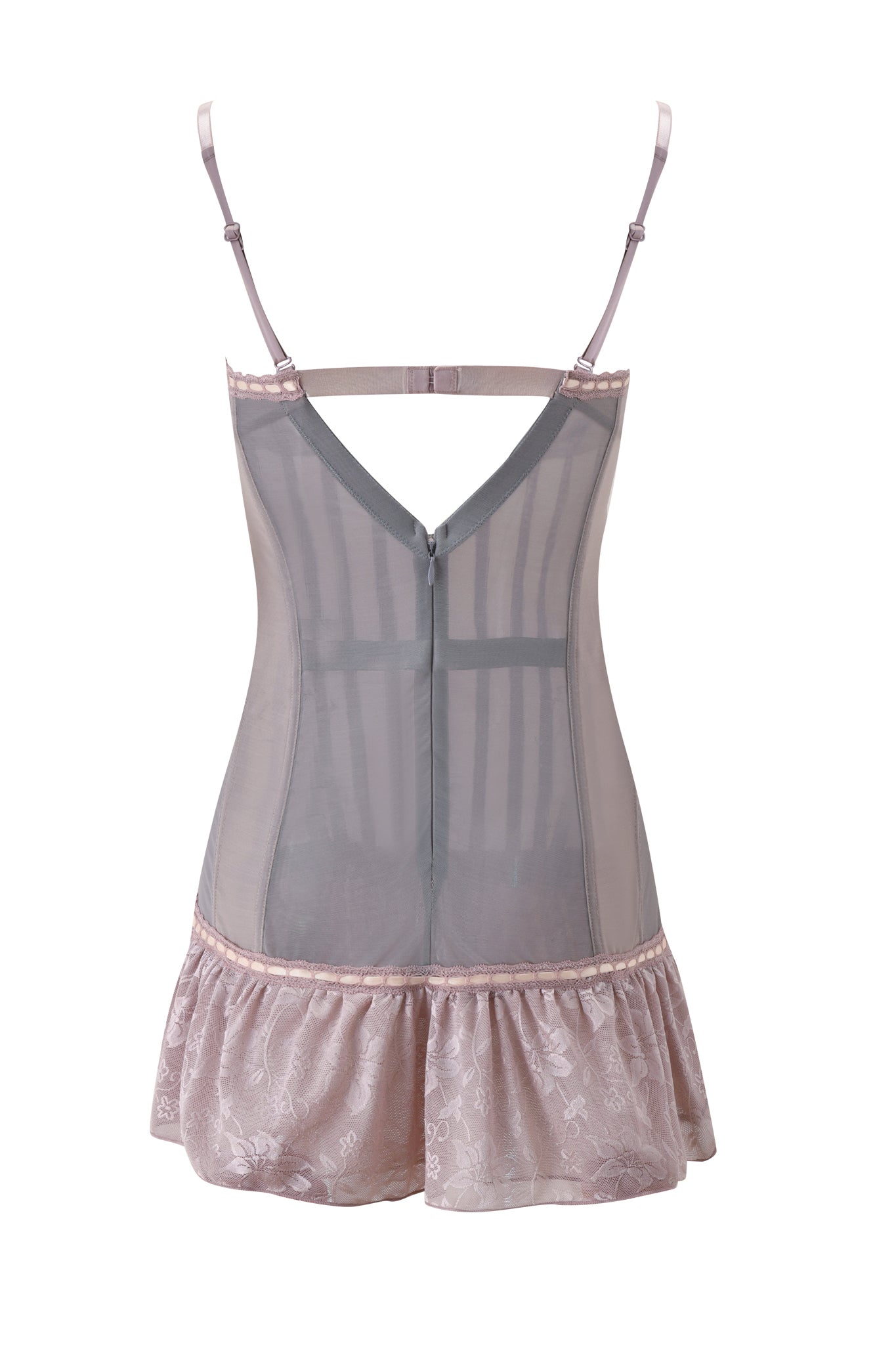 The ODETTE DRESS - DOVE by I.AM.GIA features a light pink sheer mesh design with adjustable spaghetti straps, a V-shaped back, fitted bodice, and ruffled floral lace hem.
