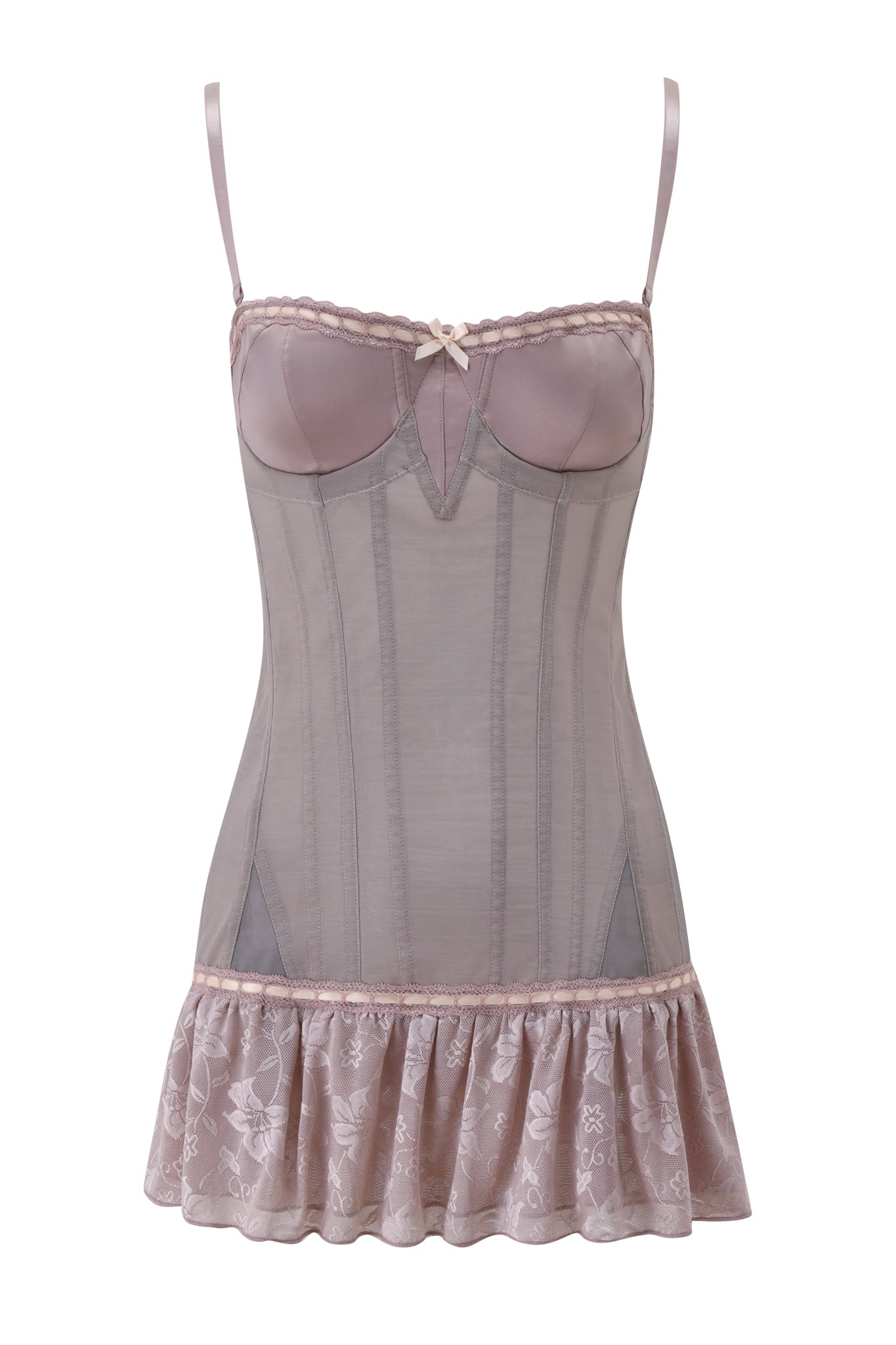 The ODETTE DRESS - DOVE by I.AM.GIA features adjustable spaghetti straps, lace trim, sheer mesh panels, structured cups with a bow detail, and a ruffled floral-patterned hem in mauve.