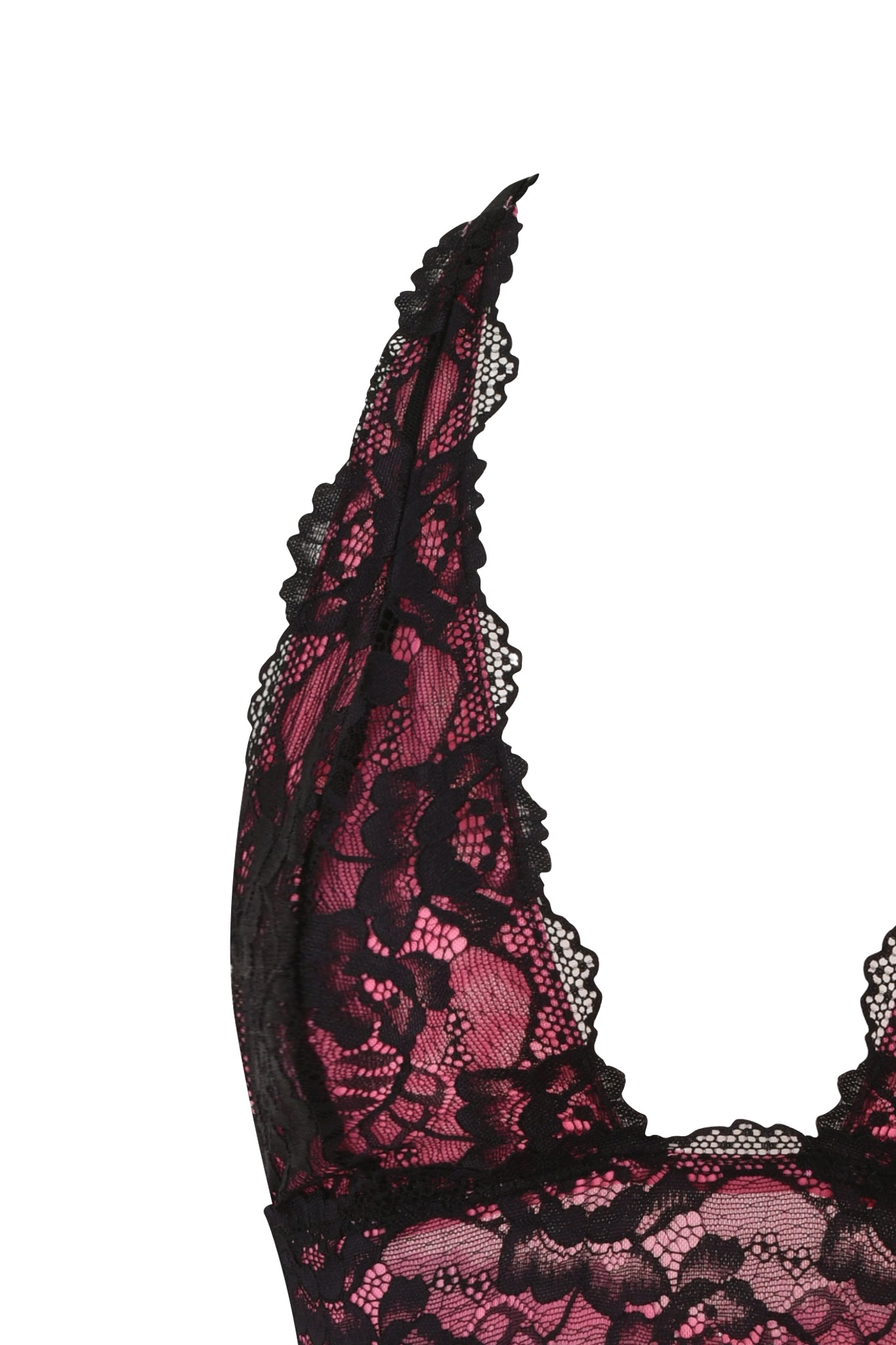Close-up of the TIFFANY TOP - PINK by I.AM.GIA, featuring black lace halter straps and floral cup patterns. The intricate lace detailing stands out beautifully against a hot pink background.