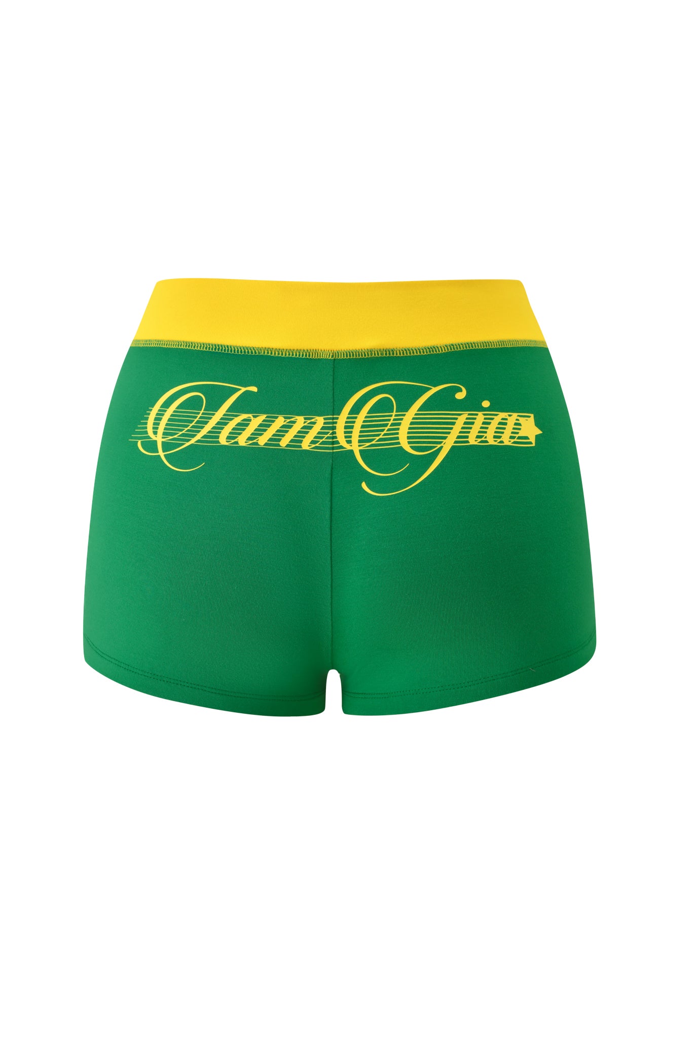 The BLARE PIPING SHORT - GREEN by I.AM.GIA is a sporty micro short with a yellow waistband, made from buttery-soft fabric and "I.AM.GIA" in yellow cursive across the back.