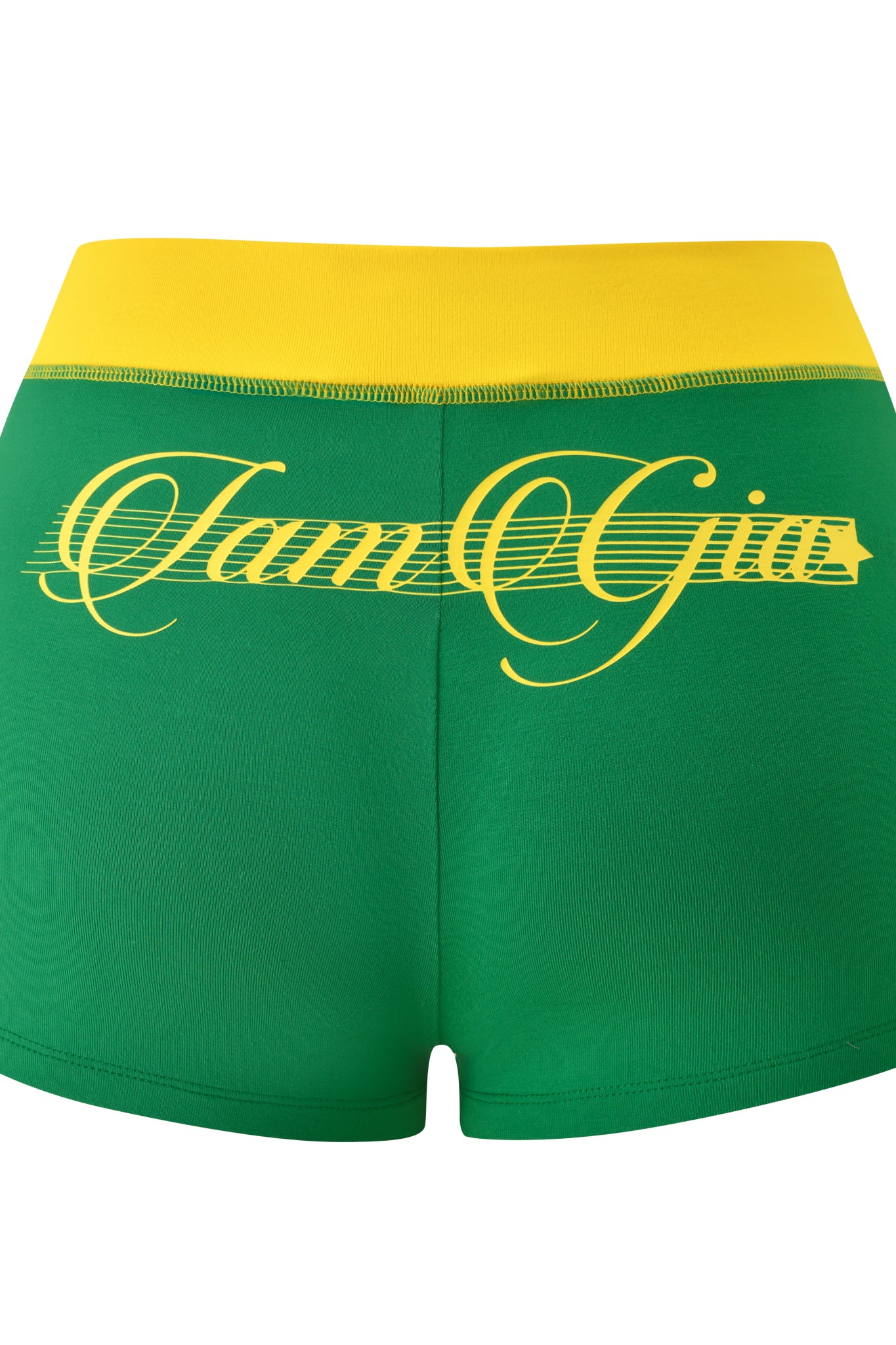The BLARE PIPING SHORT - GREEN by I.AM.GIA is a sporty green micro short featuring a wide yellow waistband and "Jam Gia" in yellow script on the back, crafted from buttery-soft fabric.