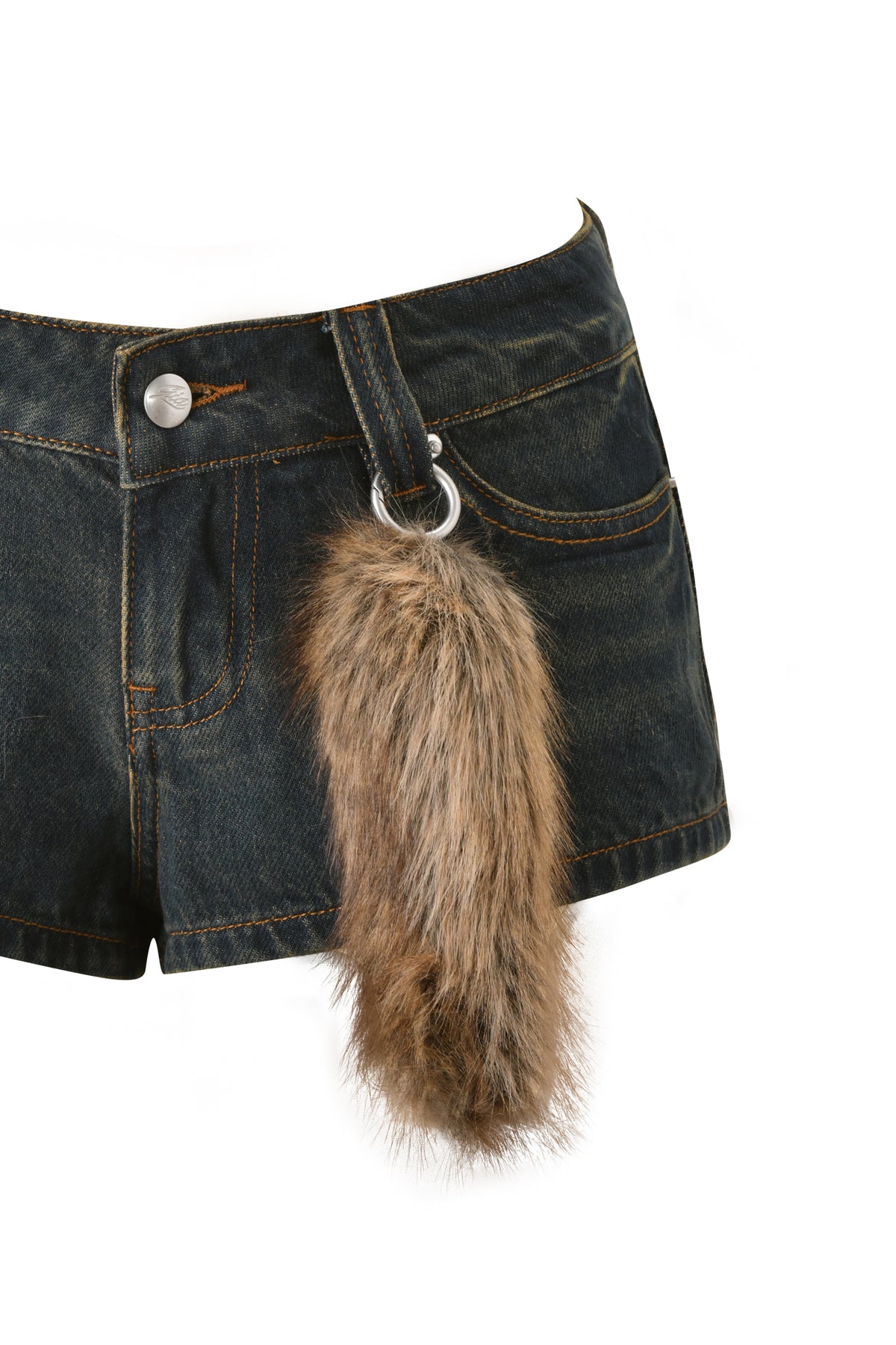 A pair of I.AM.GIA BODI DENIM HOT SHORT - DENIM featuring dark denim fabric and a brown, bushy faux fur tail keychain attached to a front belt loop.