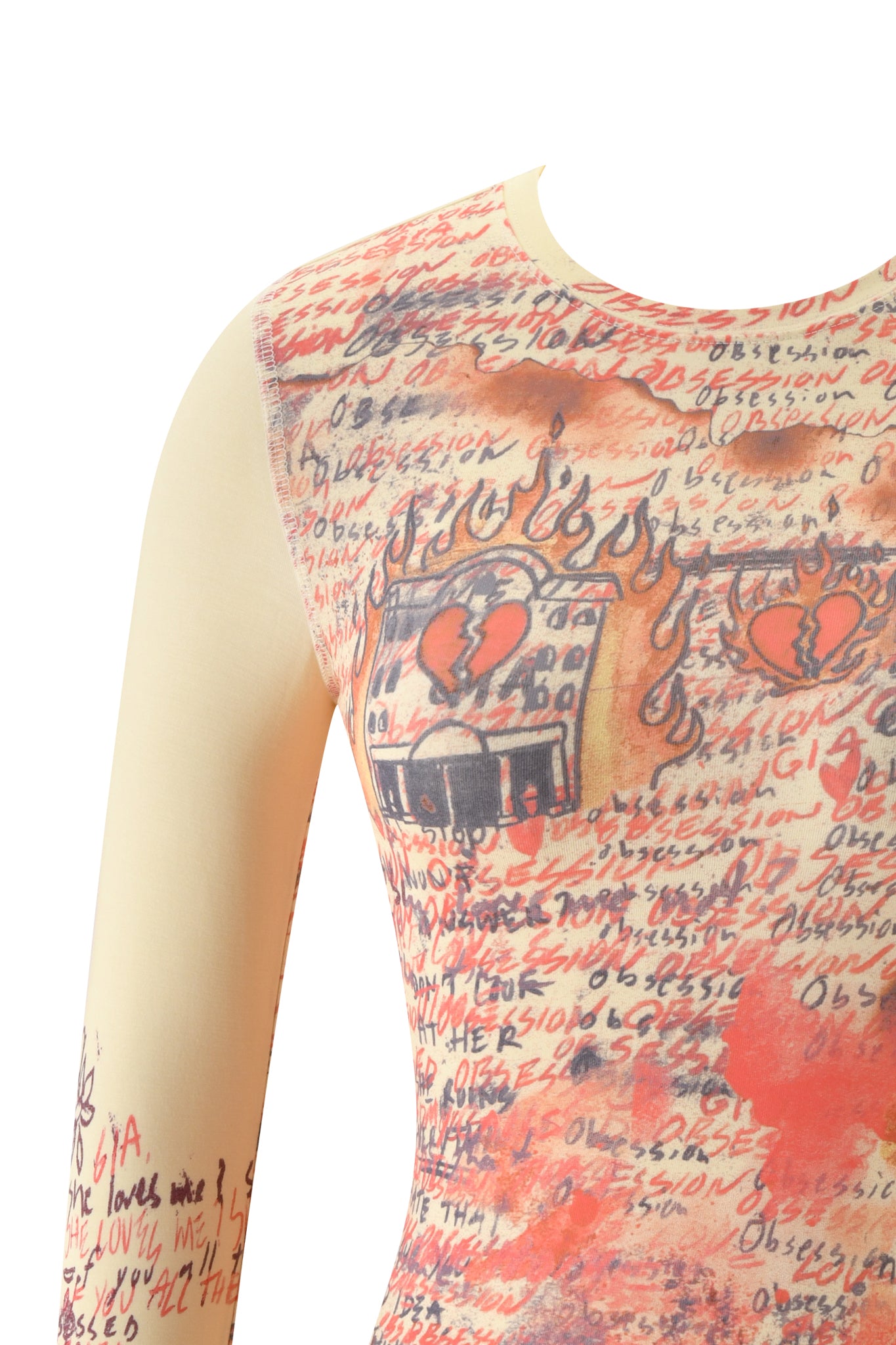 A close-up of the I.AM.GIA T-REX BLARE 2.0 LONG SLEEVE TEE in yellow, featuring a graphic print with handwritten text, red hearts, flames, and a broken heart motif on a light beige background.