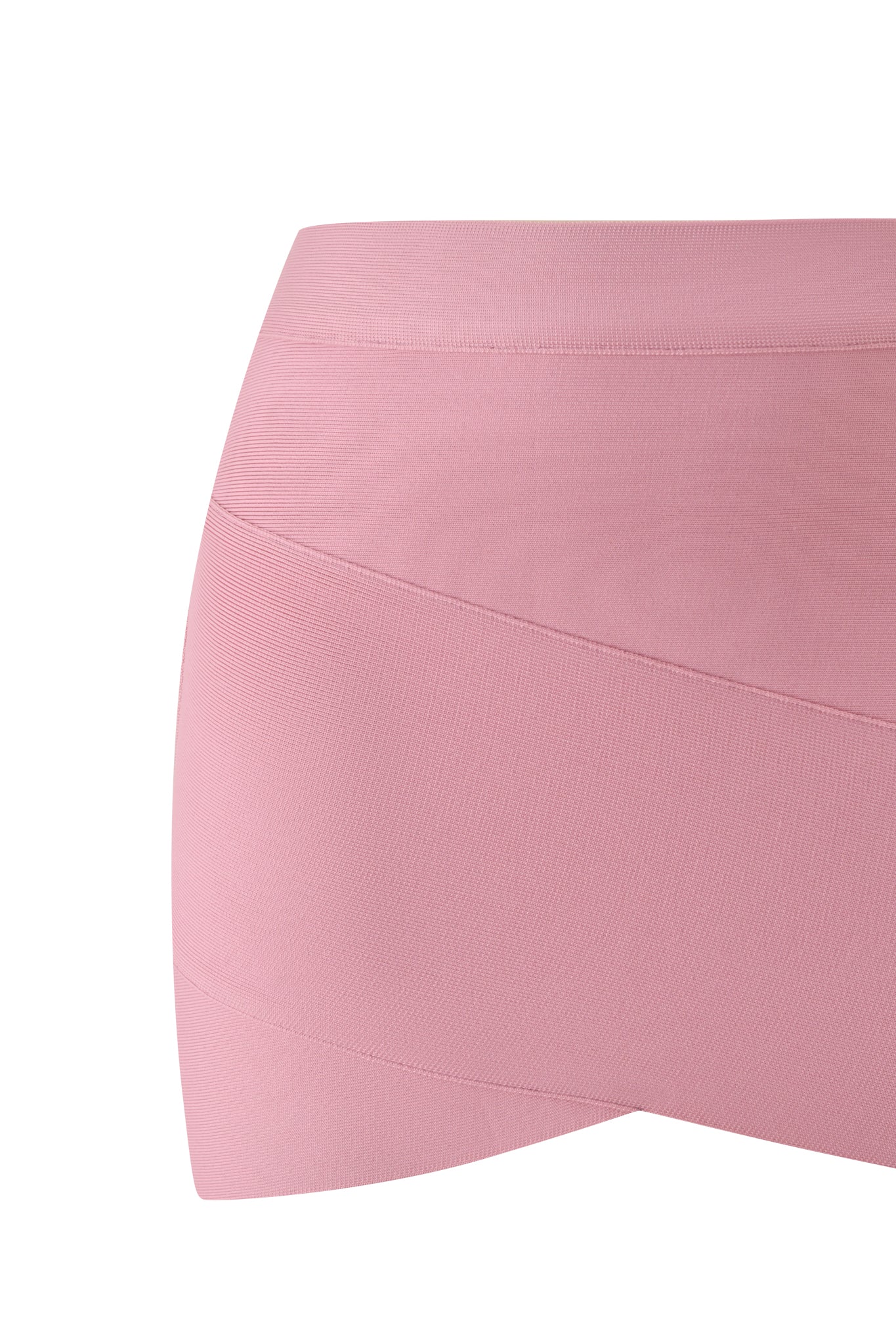 Close-up of the I.AM.GIA ISELA BANDAGE MINI SKIRT in Dusty Rose, showcasing its seamless construction and body-hugging fit that flatters like shapewear, displayed against a white background.