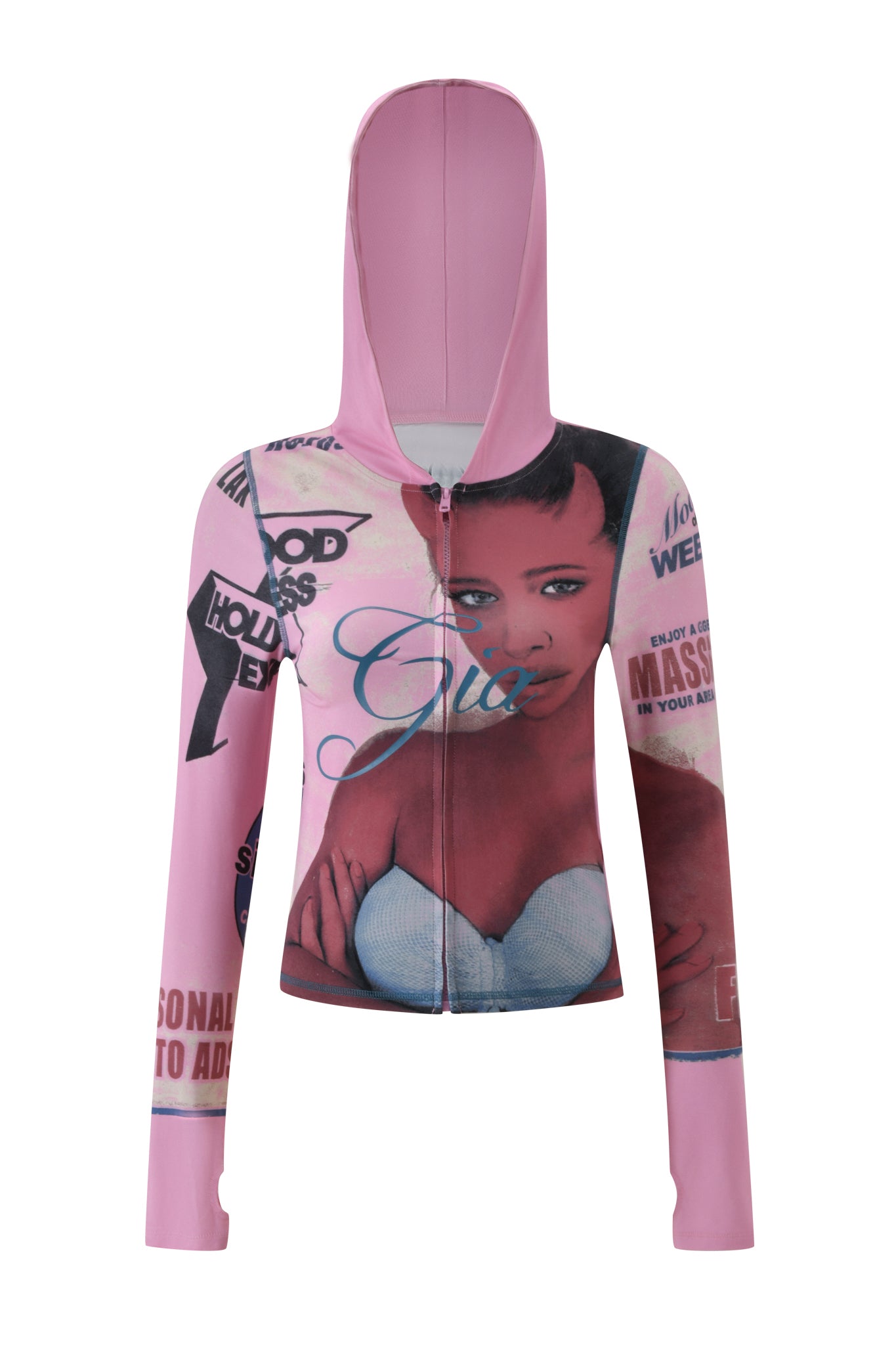 The T-REX BLARE HOODIE - PINK by I.AM.GIA is a baby pink zip-up hoodie with a hood, featuring a graphic print of a woman's face and various magazine-style text elements in black and blue.