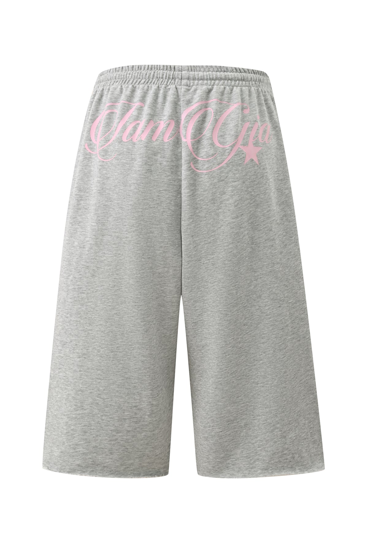 The BEX TERRY SHORT - GREY by I.AM.GIA are knee-length shorts made from soft grey marle jersey, designed with a relaxed fit and an elasticated waistband. They feature bold pink script “IamGia” lettering and a star on the back for a standout look.