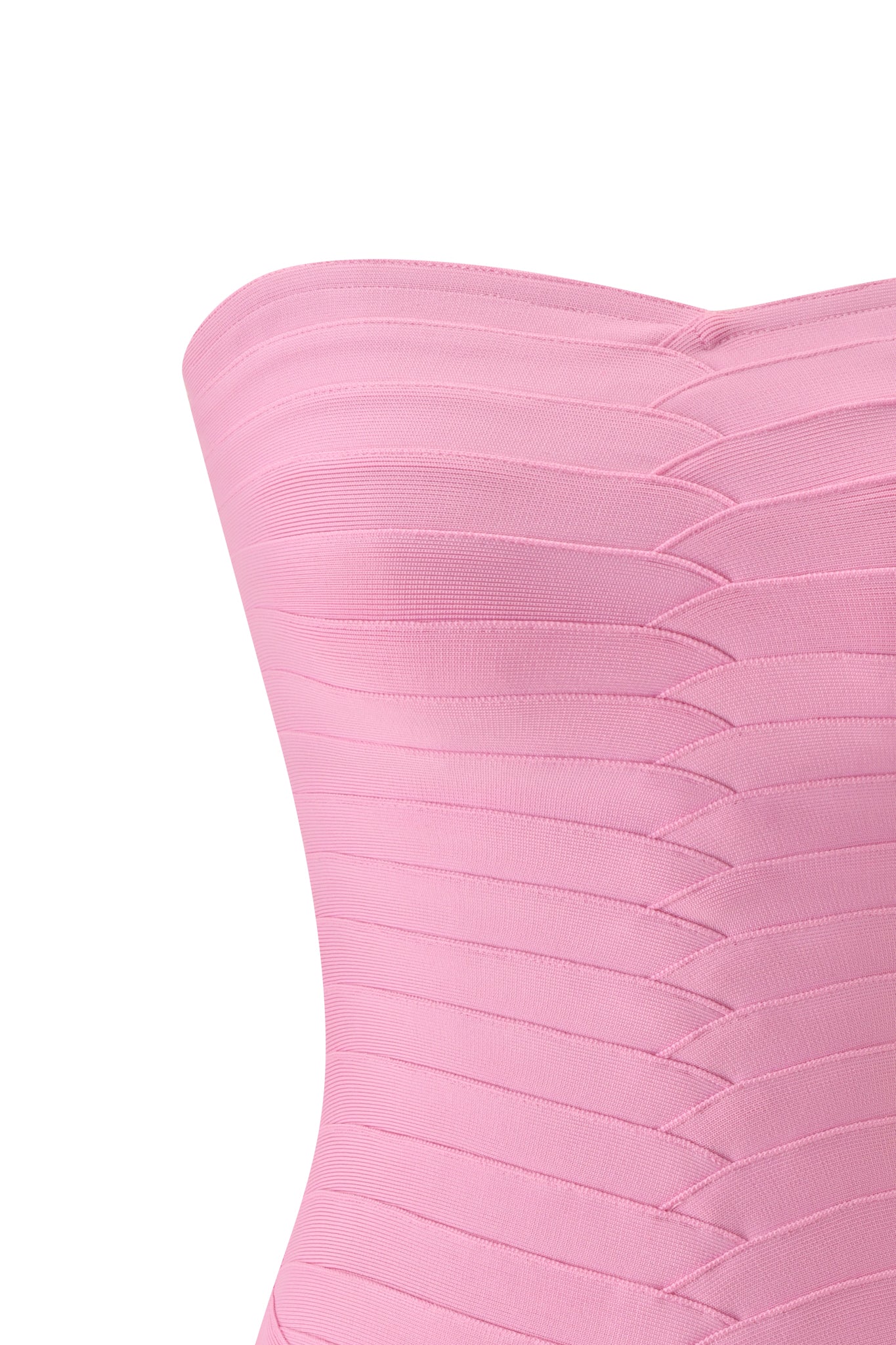 Close-up of the KHIA BANDAGE TUBE MINI DRESS in bubble gum pink by I.AM.GIA, a strapless, form-fitting mini dress featuring horizontal textured bandage-style lines and a pointed V-detail at the center front.