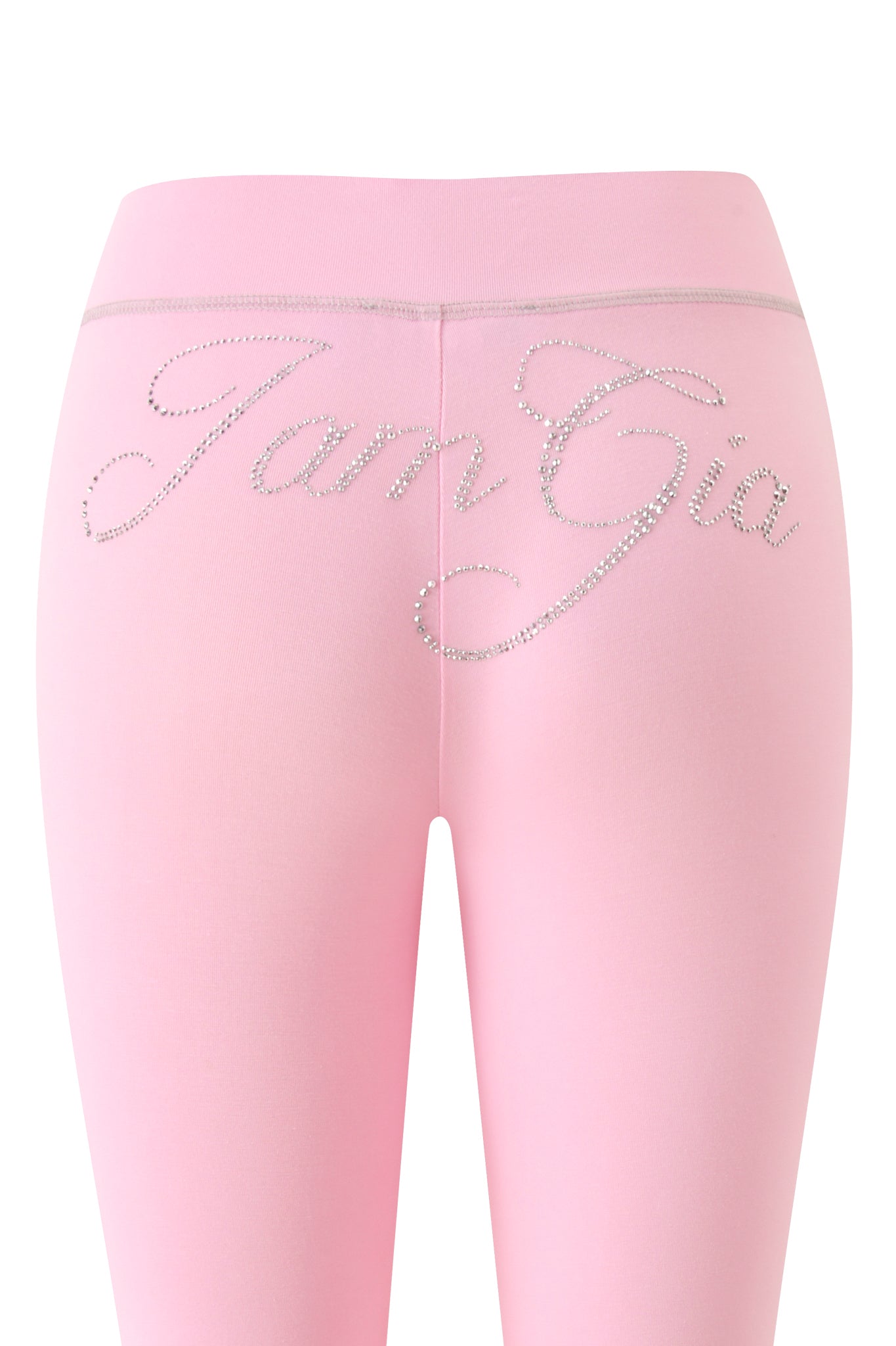 The BLARE LOW RISE DIAMONTE CAPRI - BABY PINK by I.AM.GIA showcases “I.AM.GIA” in sparkling rhinestones across the back, just below the waistband. Crafted from ultra-soft bamboo fabric, these capri pants offer a smooth feel, a fitted silhouette, and a stylish low rise capri cut.
