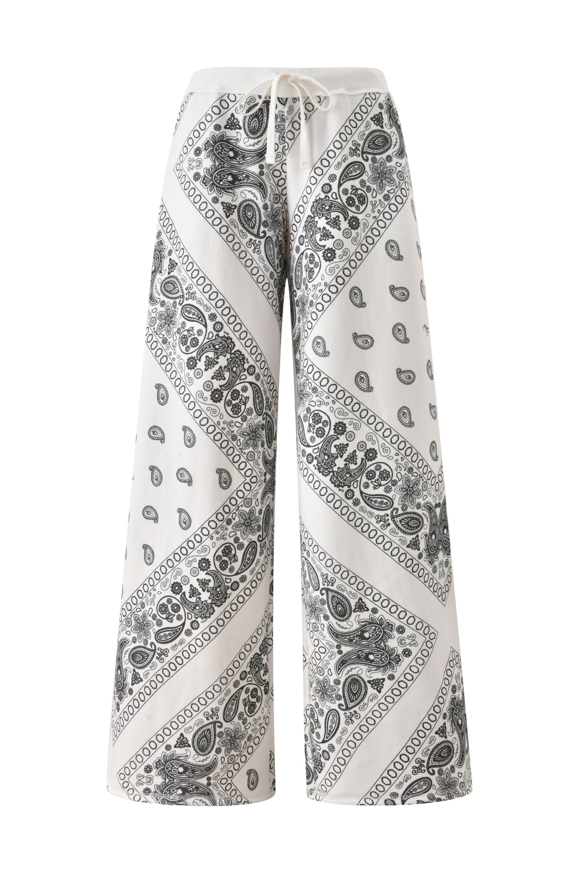 The T-REX TRACKPANT - PAISLEY by I.AM.GIA are white, wide leg sweatpants with a black diagonal paisley print, drawstring waist, and loose fit.