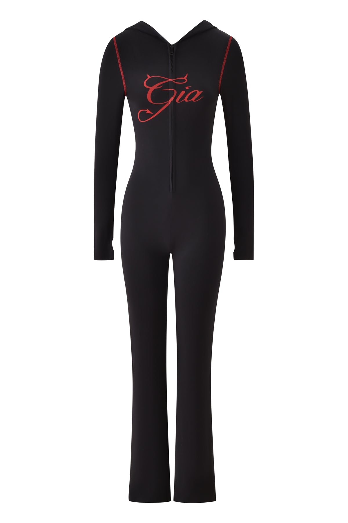 The BLARE HORN JUMPSUIT - BLACK by I.AM.GIA is a black, long-sleeve jumpsuit with a devil horn hood and front zipper, featuring “Gia” in red cursive across the chest for an edgy look.