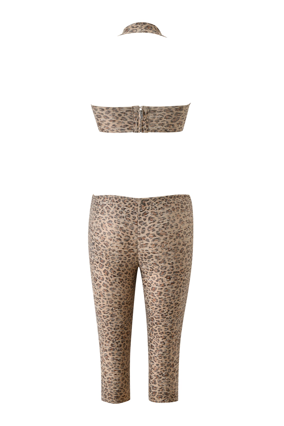 Back view of the EVA BANDAGE CAPRI JUMPSUIT - LEOPARD ANIMAL FOIL by I.AM.GIA, a three-piece set with strapless bandeau, capri pants, and matching headband in bold leopard print on a white background.
