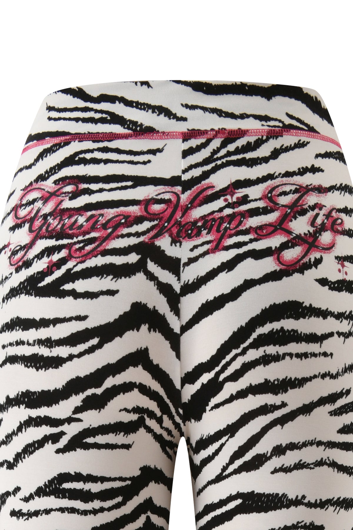 I.AM.GIA YVL BLARE TRACKPANT - ZEBRA featuring “Young Vamp Life” embroidered in pink cursive across the back.