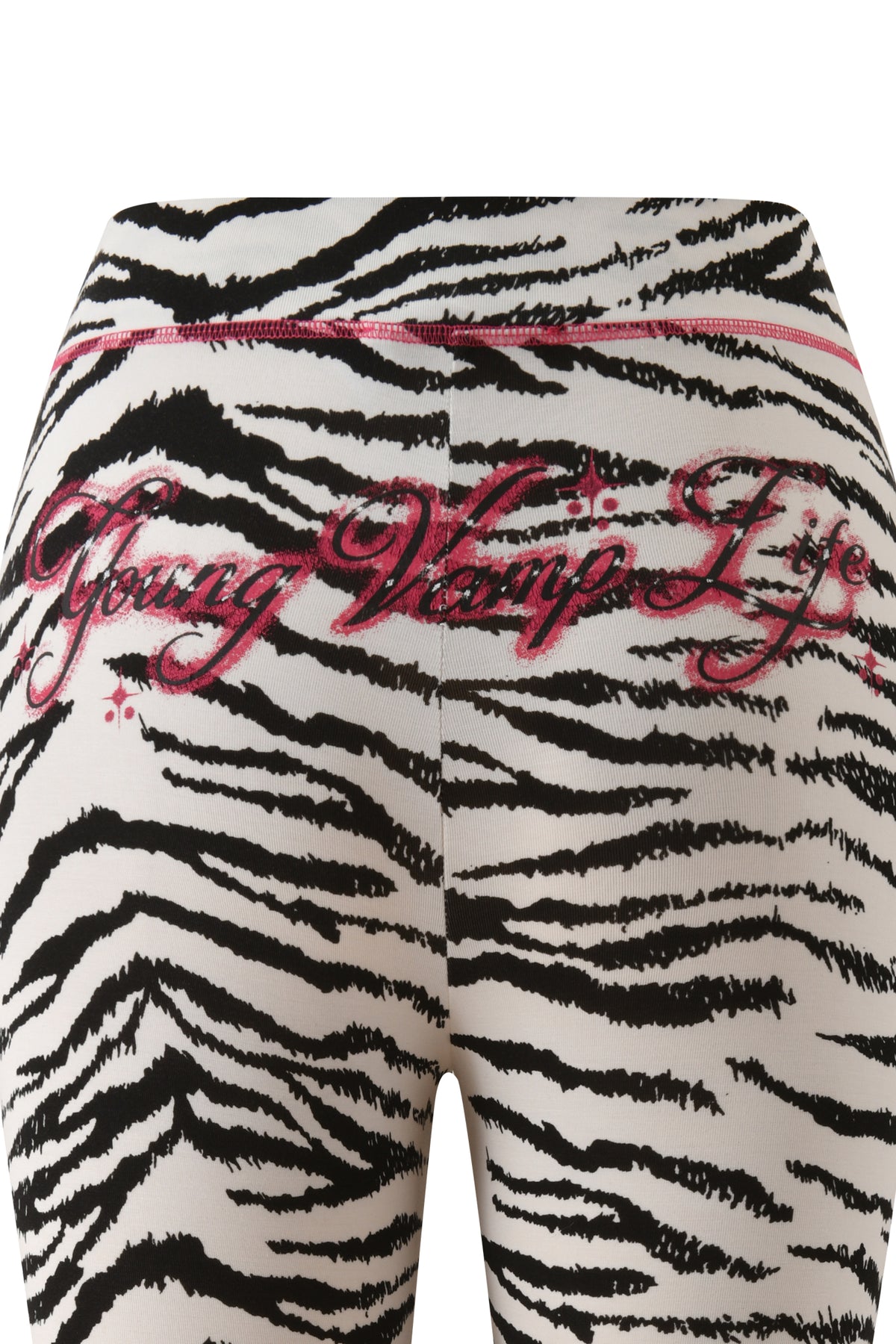 YVL BLARE CAPRI - ZEBRA capri pants in a black and white zebra print with the words “Young Vamp Life” in pink glitter script across the back.