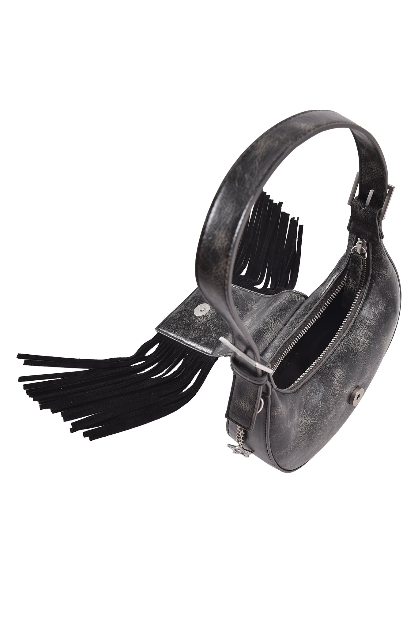 The TIA BAG - BLACK FRINGE by I.AM.GIA is a small black faux leather purse with a thick handle, magnetic flap closure, silver zipper, long black fringe detail, adjustable strap, and visible interior compartment for convenience.
