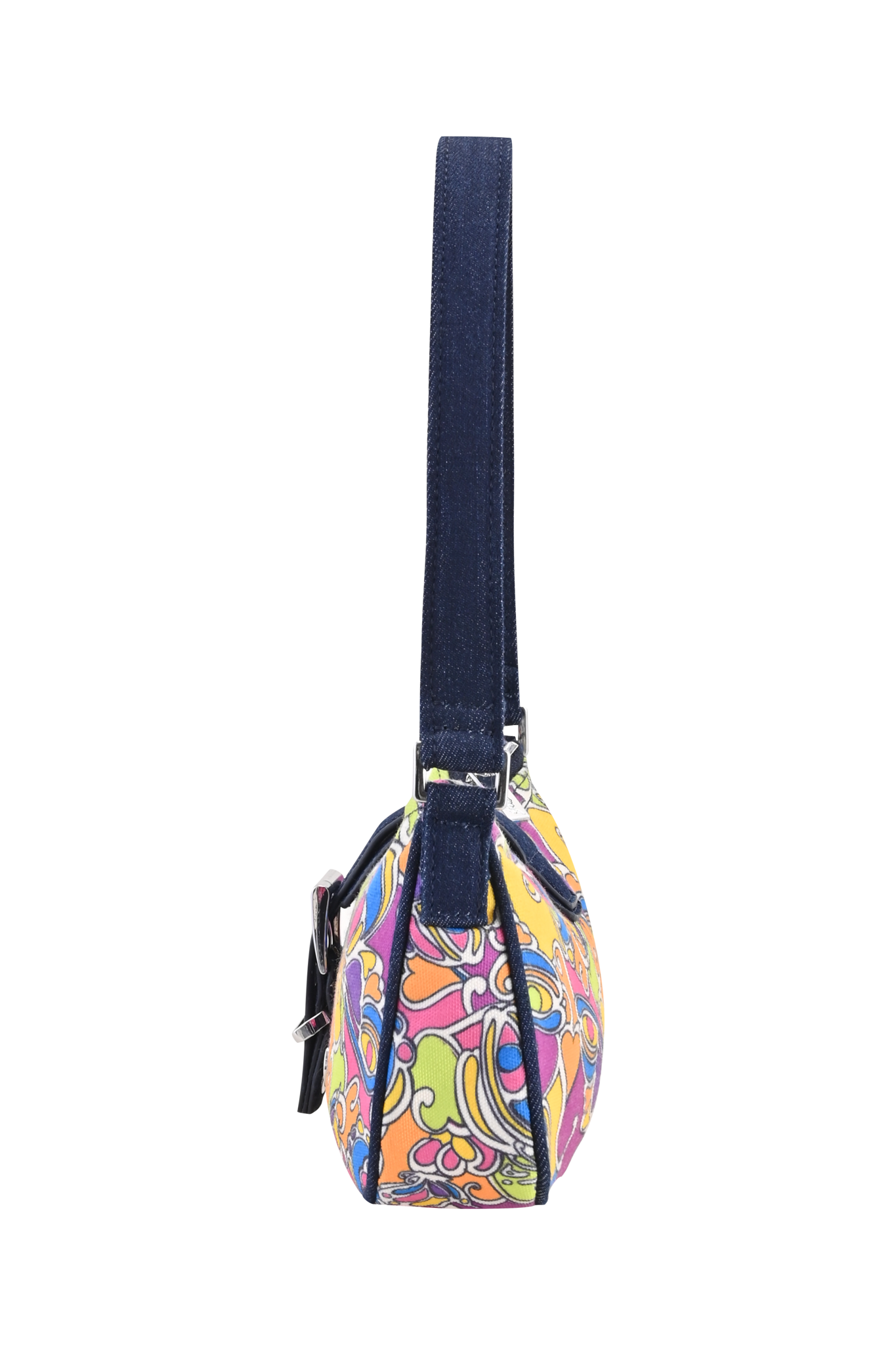 A side view of the I.AM.GIA LILLIA BAG - TROPICAL BUTTERFLY BLOOM, a small accessory featuring vibrant swirling patterns and a dark blue strap, photographed against a striped, blurred background.