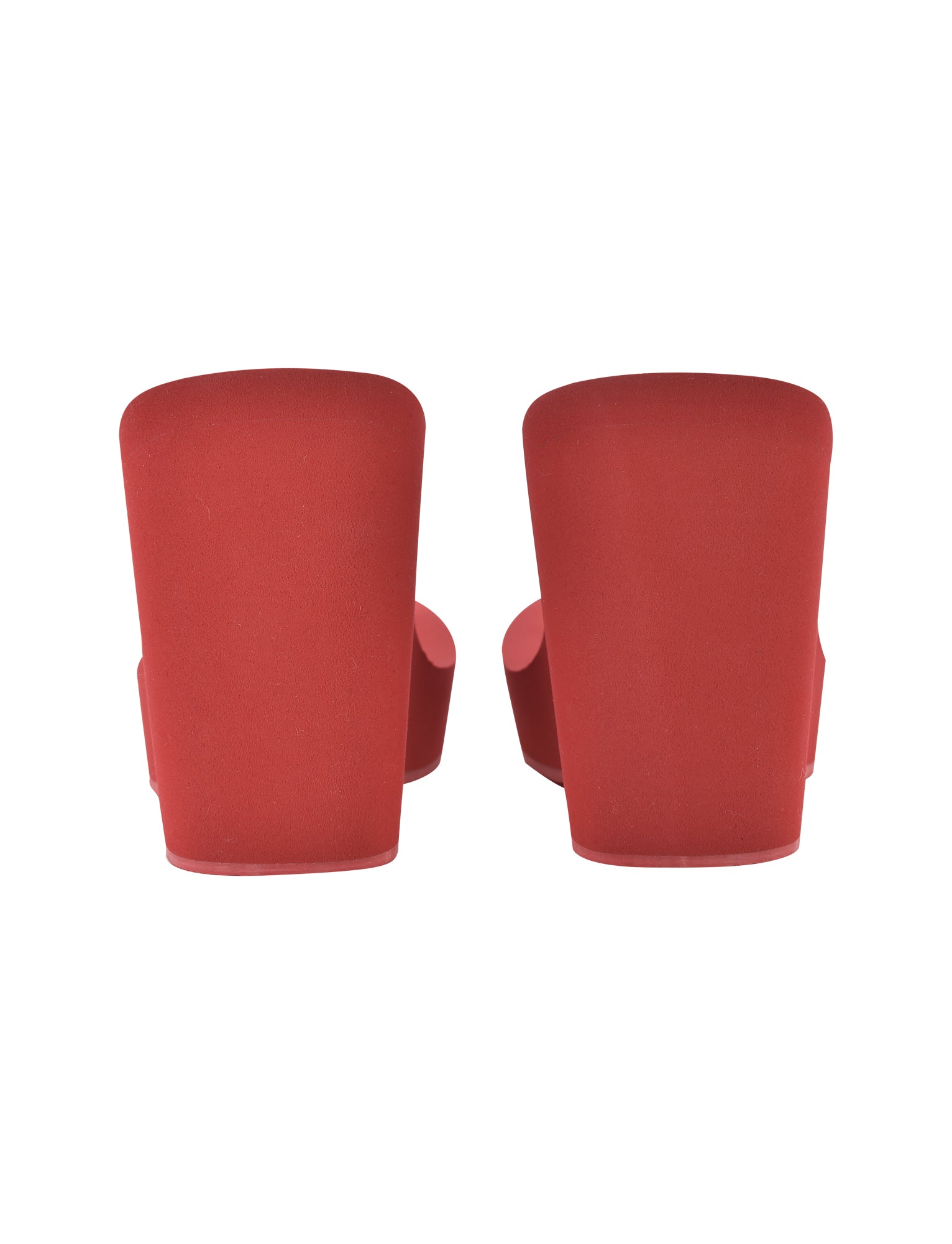 Back view of a pair of I.AM.GIA's SHELBY FLIP FLOP in red, featuring thick rectangular heels that embody the brand's bold style. The shoes are on a white background and appear unworn.