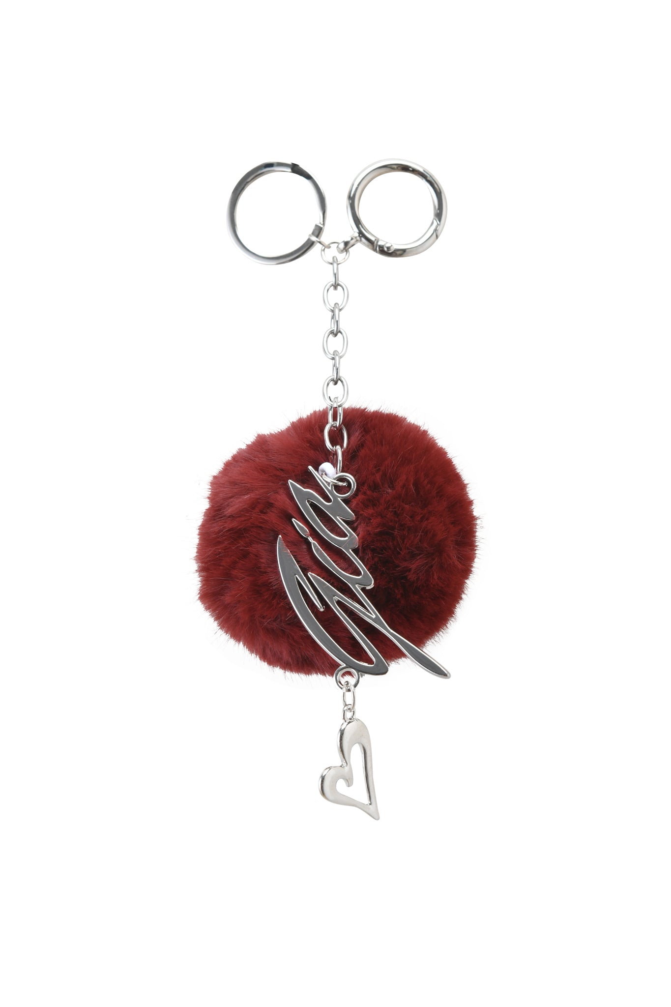 The LARSA KEYCHAIN - RED by I.AM.GIA features a deep red faux fur pom-pom, a metallic "hello" script detail, and a small dangling silver heart charm.