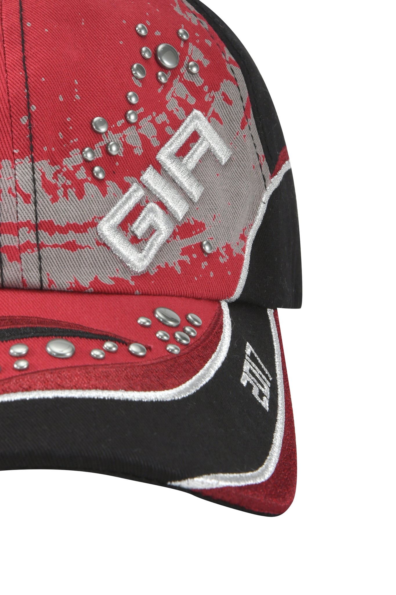 Close-up of the SERENA HAT - RED by I.AM.GIA, a cotton twill racing cap with silver embroidered "GIA" text, silver studs and patterns on the front and brim, plus an adjustable strap back, shown on a white background.