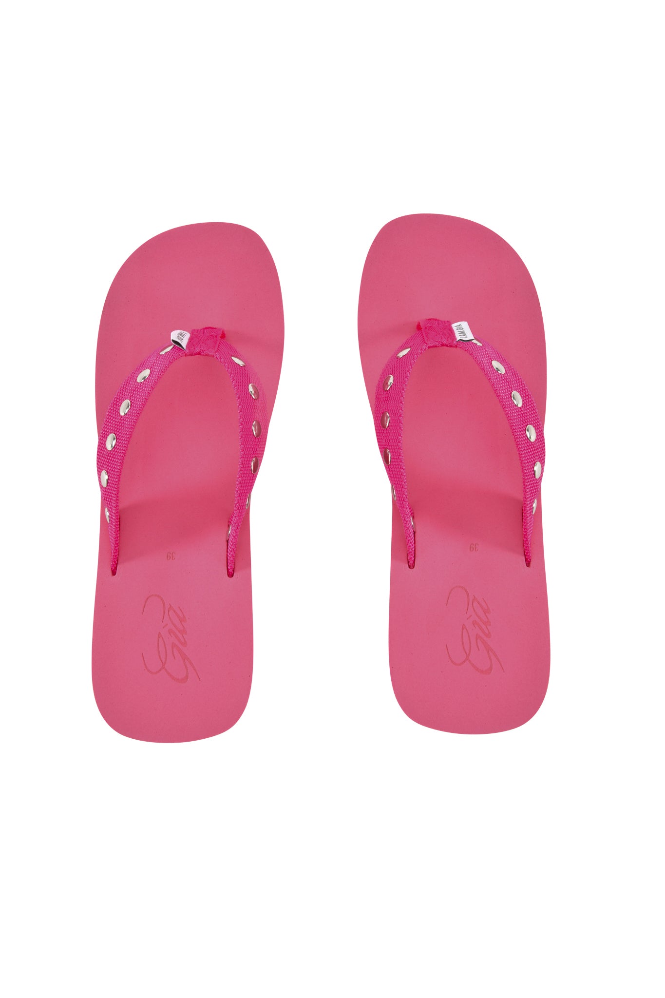 A pair of I.AM.GIA SHELBY STUDDED FLIP FLOP 2.0 sandals in hot pink with rhinestone-studded straps, displayed side by side on a white background.