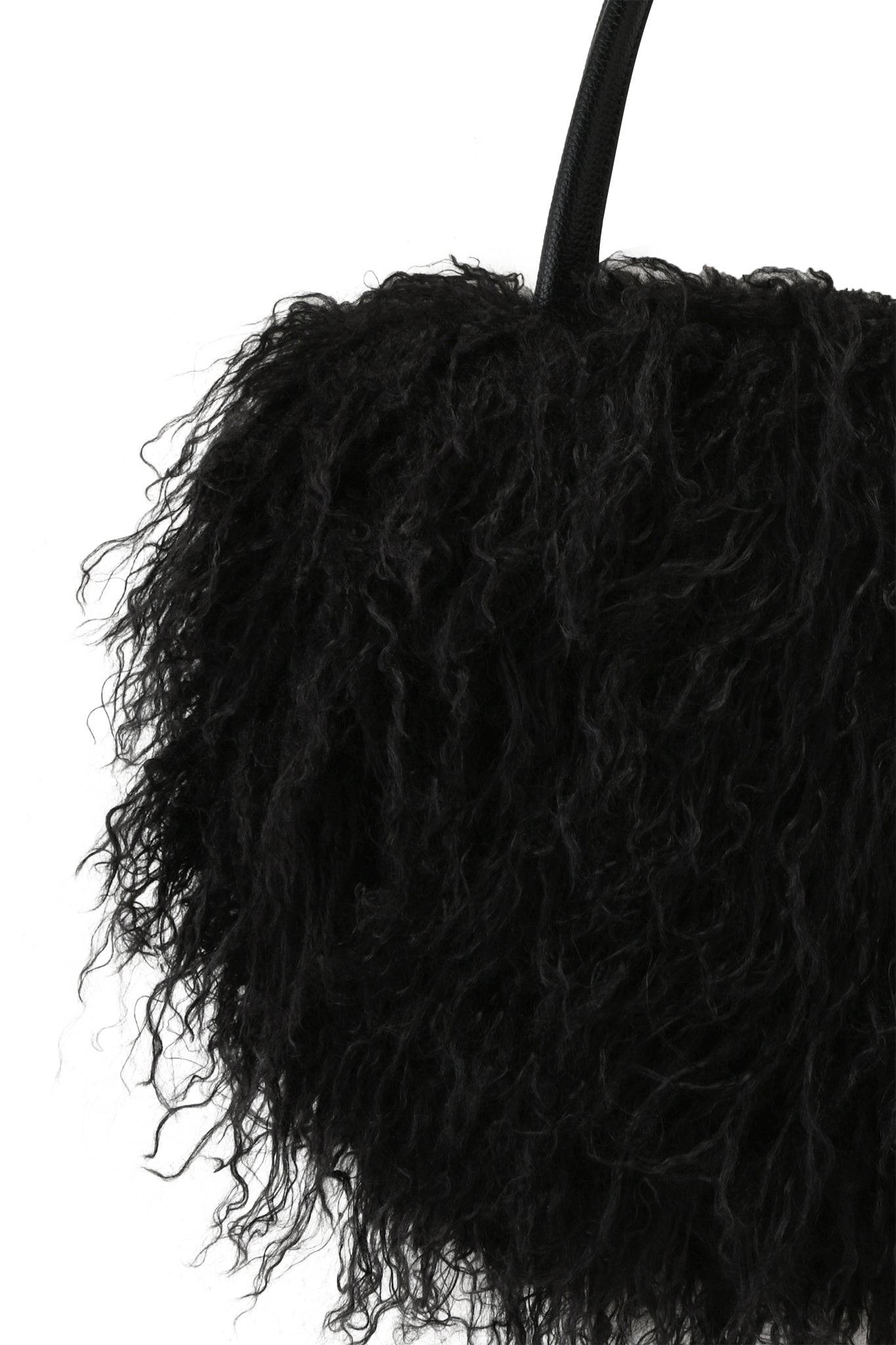 The I.AM.GIA PIXI FAUX FUR BAG in black features a shaggy, textured faux fur surface and a single thin shoulder strap.