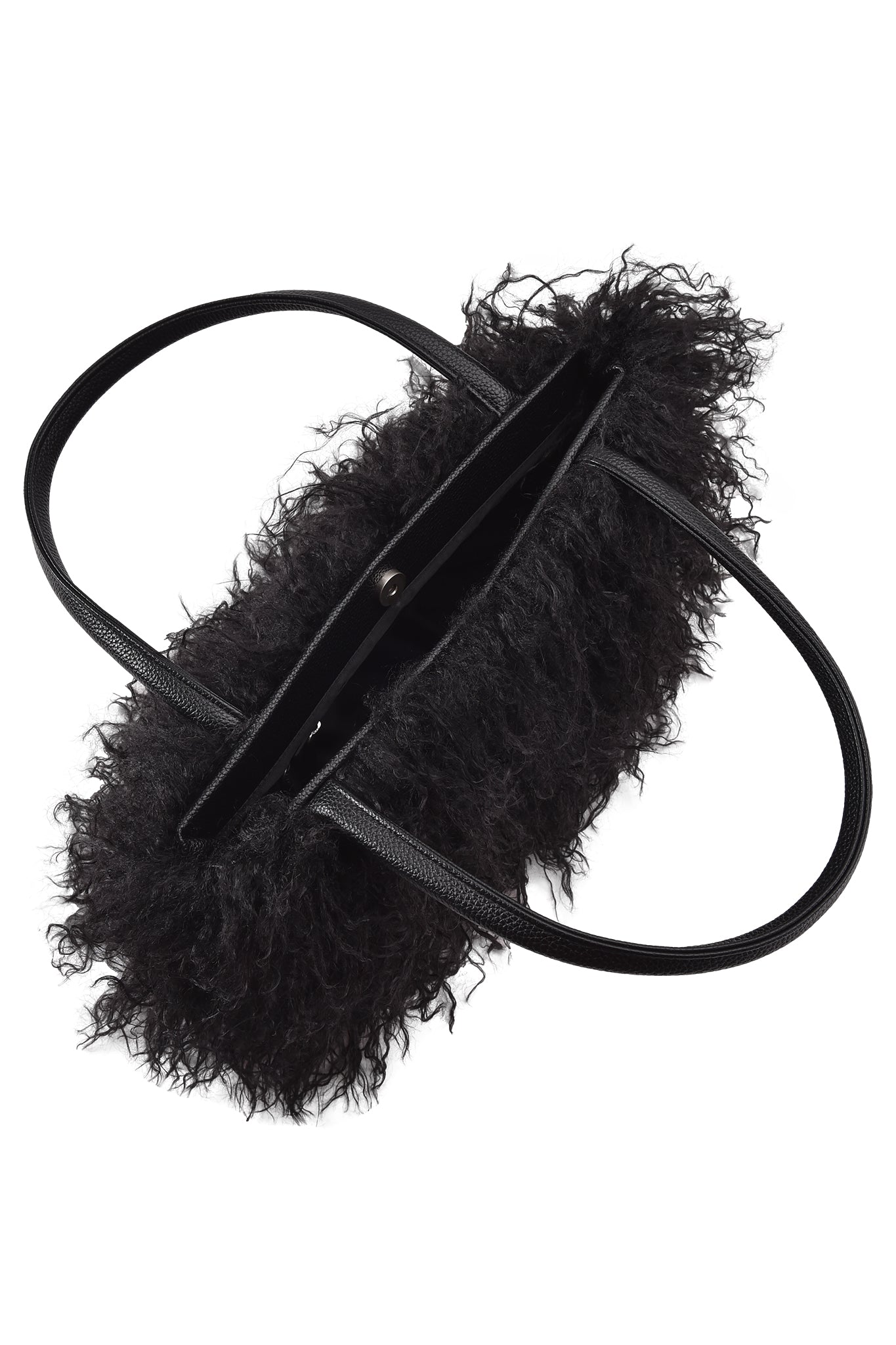 The I.AM.GIA PIXI FAUX FUR BAG - BLACK features a soft, textured faux fur exterior, two thin faux leather handles, an open top with snap closure, and is shown against a white background.