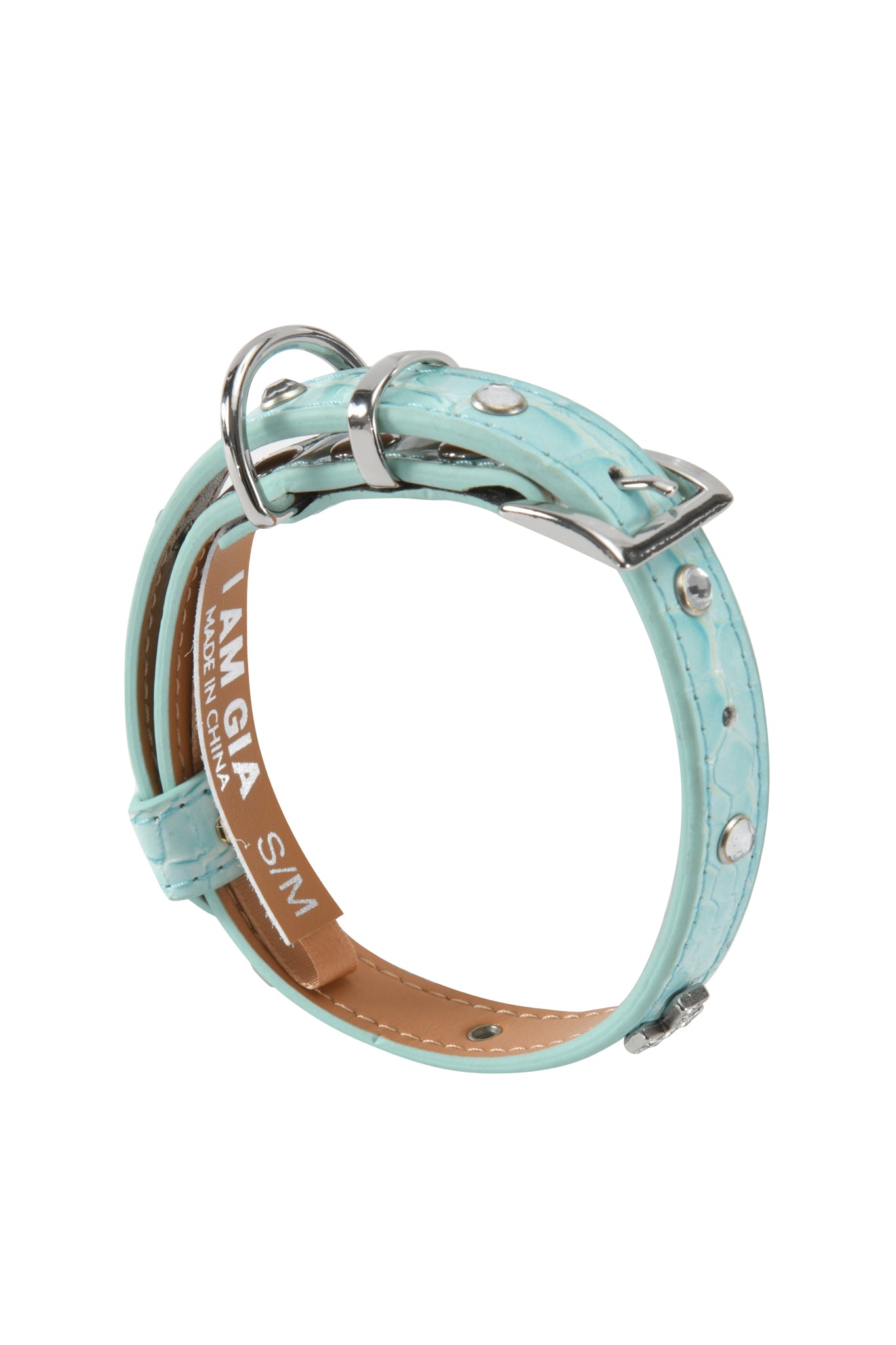 The STAR PET COLLAR - BABY BLUE by I.AM.GIA features baby blue faux leather with silver studs, buckle, and two metal rings. The brown inner side is labeled with the brand and size—ideal for adding style to your pet’s look.