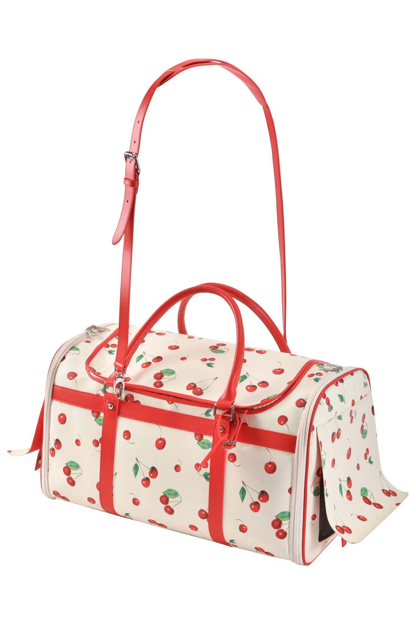 The I.AM.GIA TRIXX PET CARRIER - CHERRY ON TOP is a cream duffel with red handles, trim, cherry print, and an adjustable red strap—ideal as a stylish small pet or dog carrier for your furry friend.