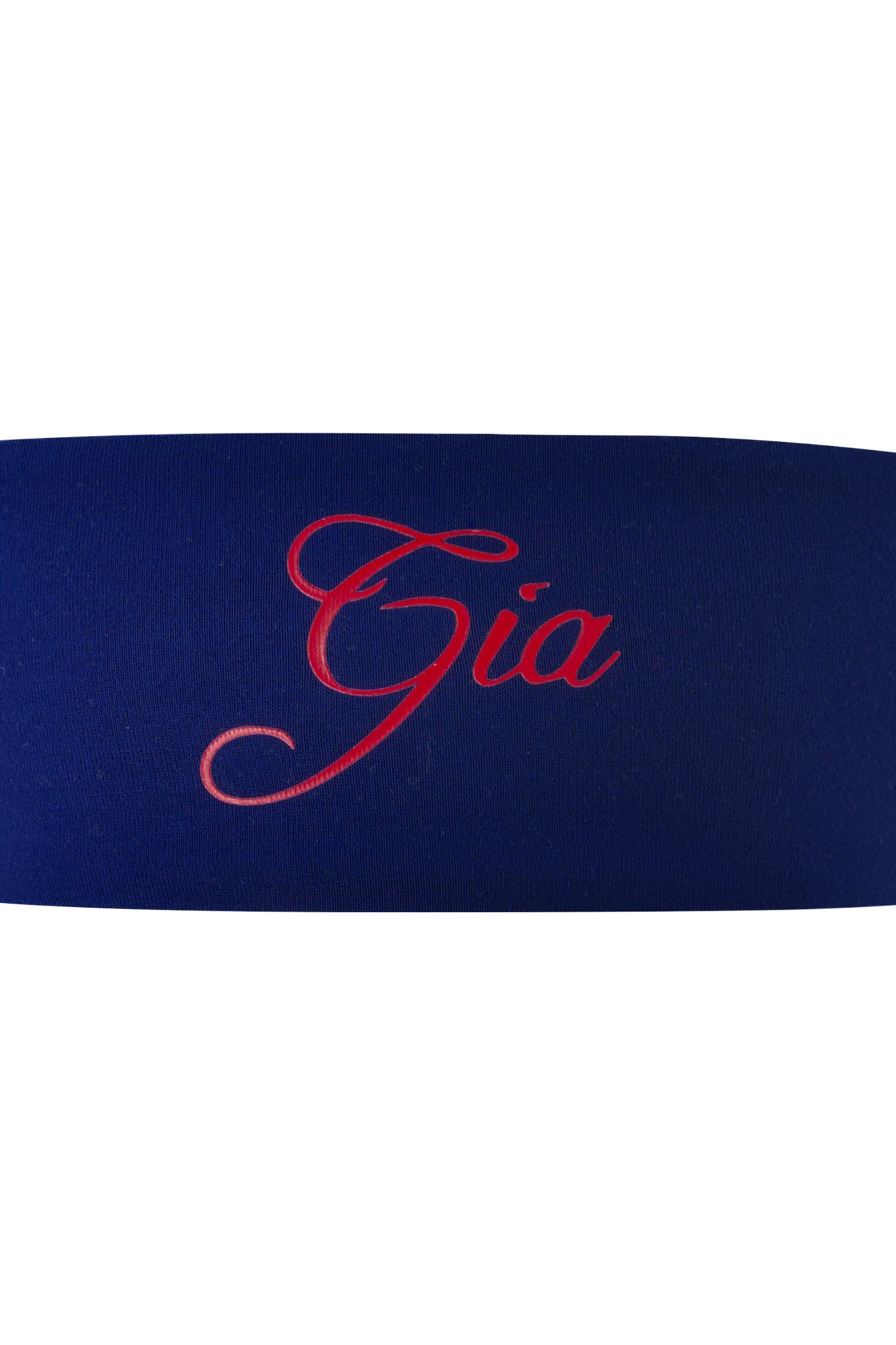 The BLARE SPORT HEADBAND - NAVY by I.AM.GIA features "Gia" in elegant red script, making it a stylish and sporty soccer headband.