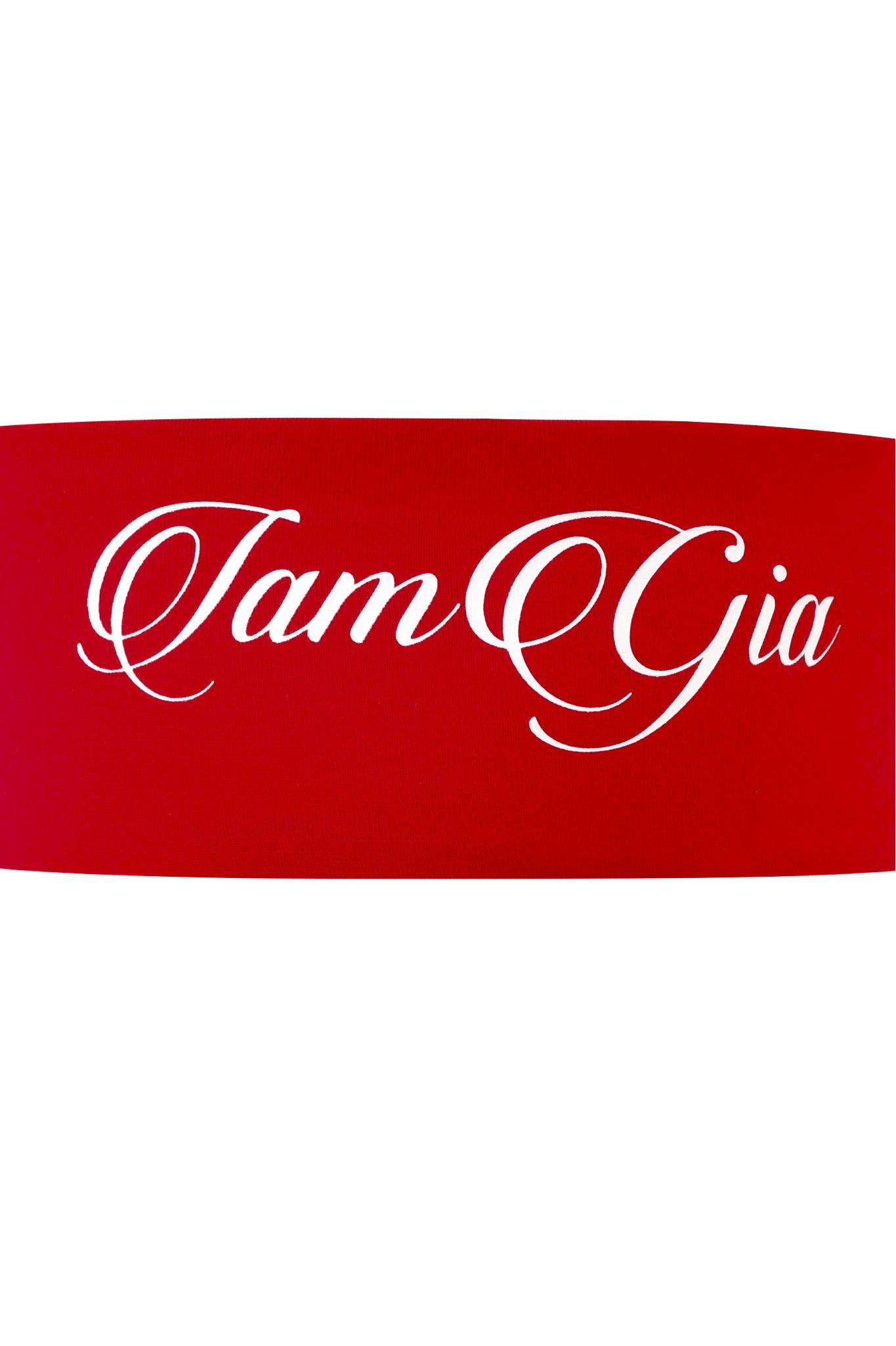 The I.AM.GIA BLARE SPORT HEADBAND in crimson features red fabric with "Iam Gia" in elegant white script, adding a sporty touch to any look.