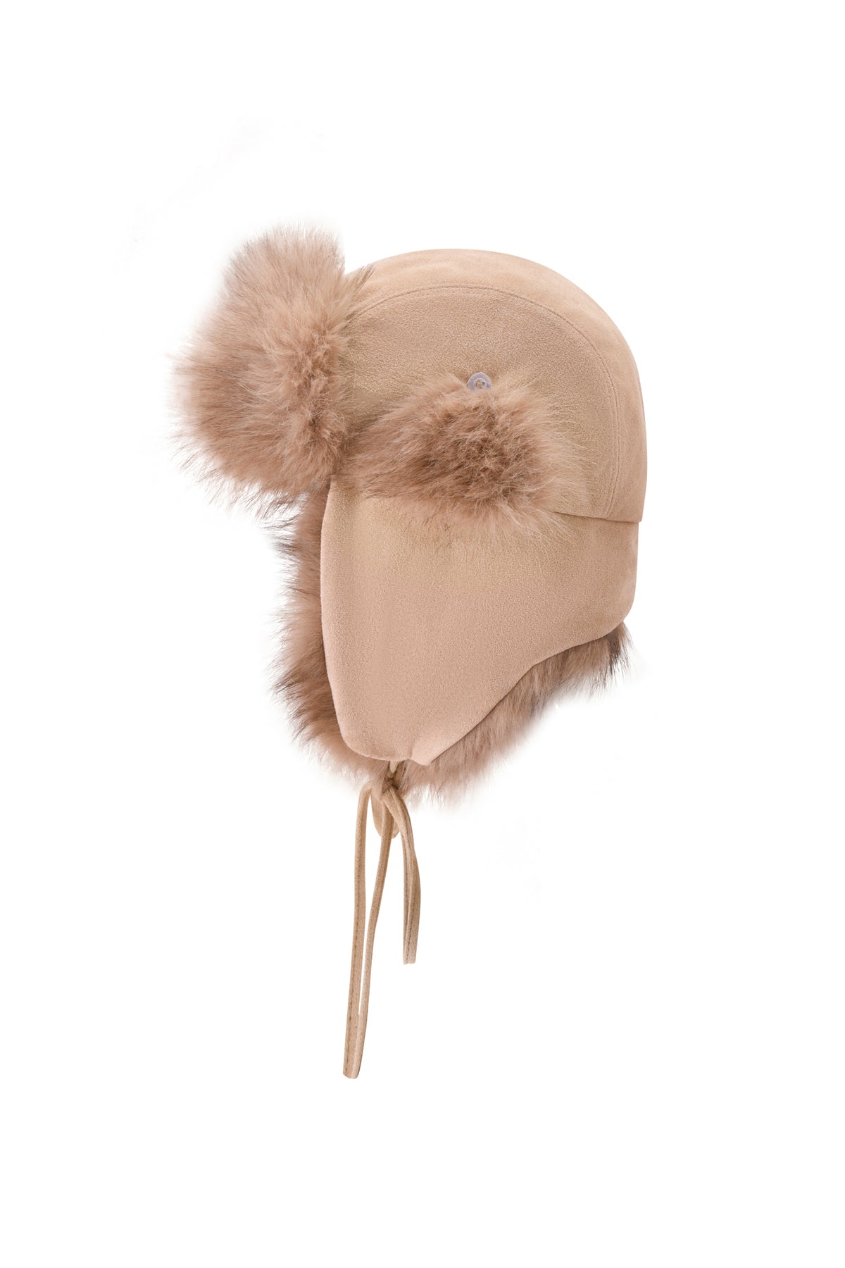 The I.AM.GIA GENA FAUX FUR TRAPPER HAT in tan suede features a reversible design and cozy pom-poms on the ear flaps, making it a stylish choice for winter. Displayed against a white background.