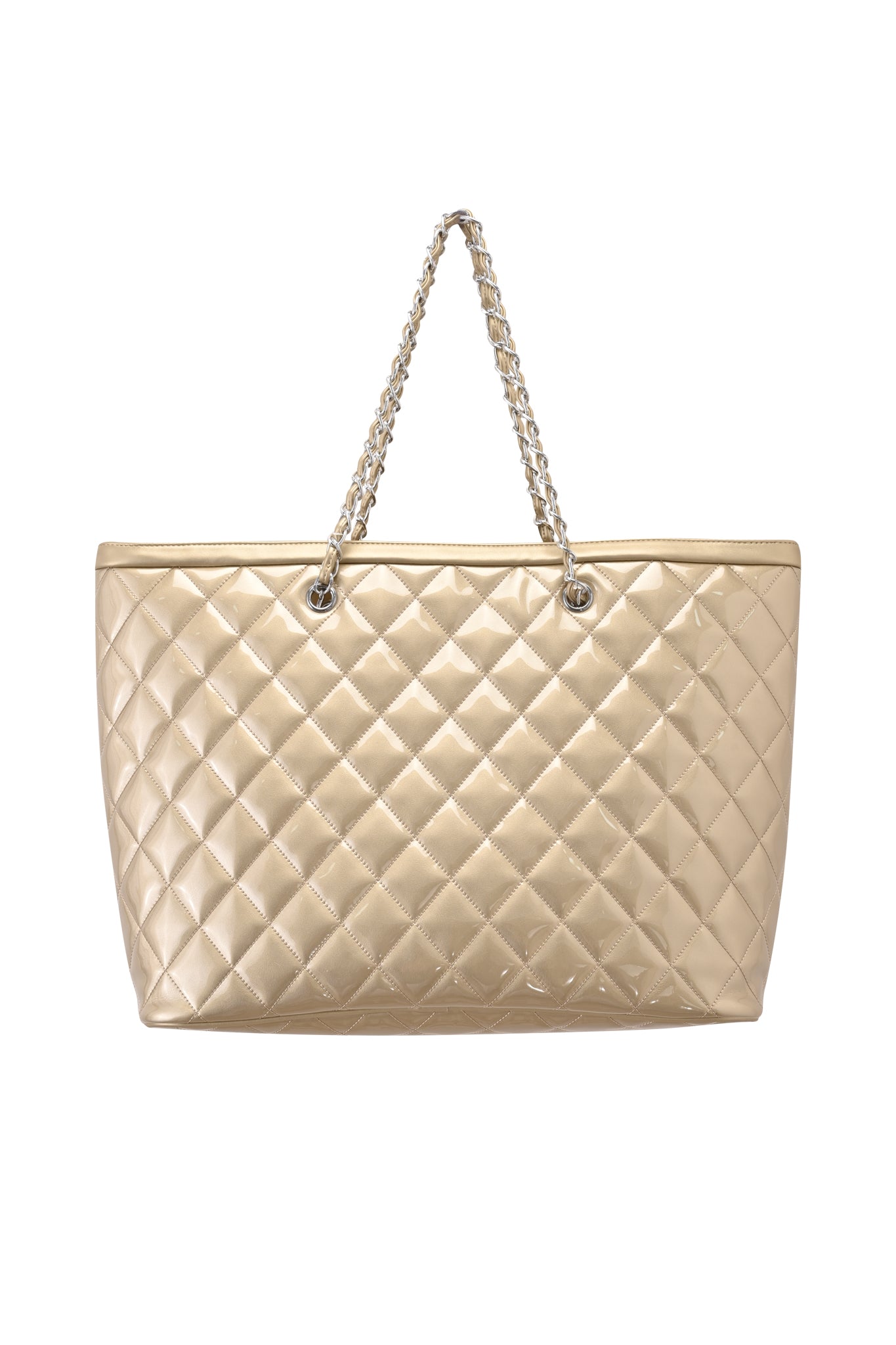Introducing the DANNI TOTE BAG - GOLD by I.AM.GIA: a metallic gold tote bag crafted from quilted leather, featuring chain handles and silver grommet details, elegantly displayed against a white background.