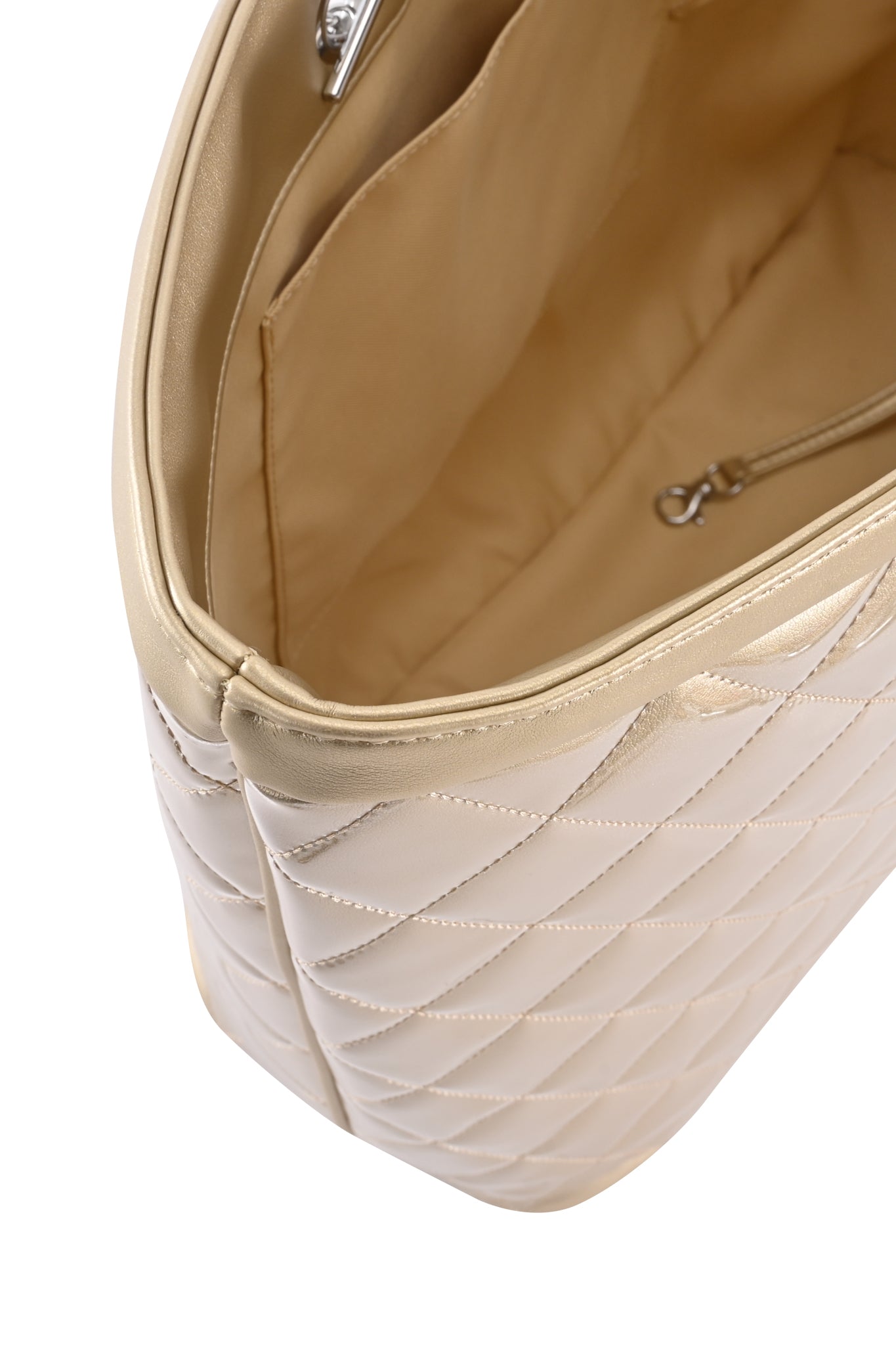 The DANNI TOTE BAG - GOLD by I.AM.GIA features a beige quilted design with a soft, padded texture, shown partially open to reveal its spacious interior, zippered pocket, and small metal clasp inside—perfect for those who appreciate the classic I.AM.GIA aesthetic.