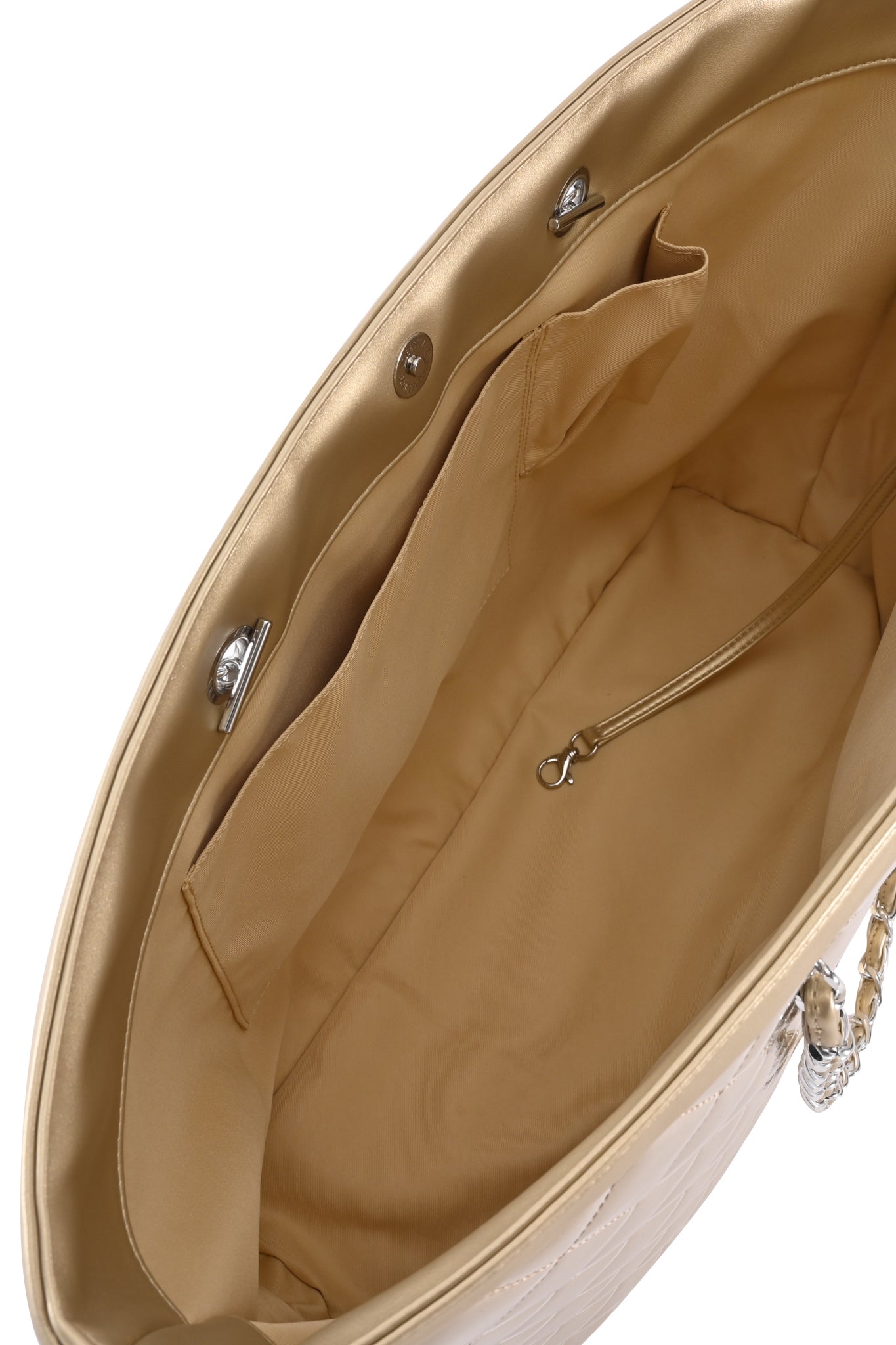 The DANNI TOTE BAG - GOLD by I.AM.GIA features a beige-lined interior with a zippered pocket, an open pocket, a snap button closure, and a metal key clasp—perfectly crafted to complement your favorite I.AM.GIA bag or PVC shell tote.