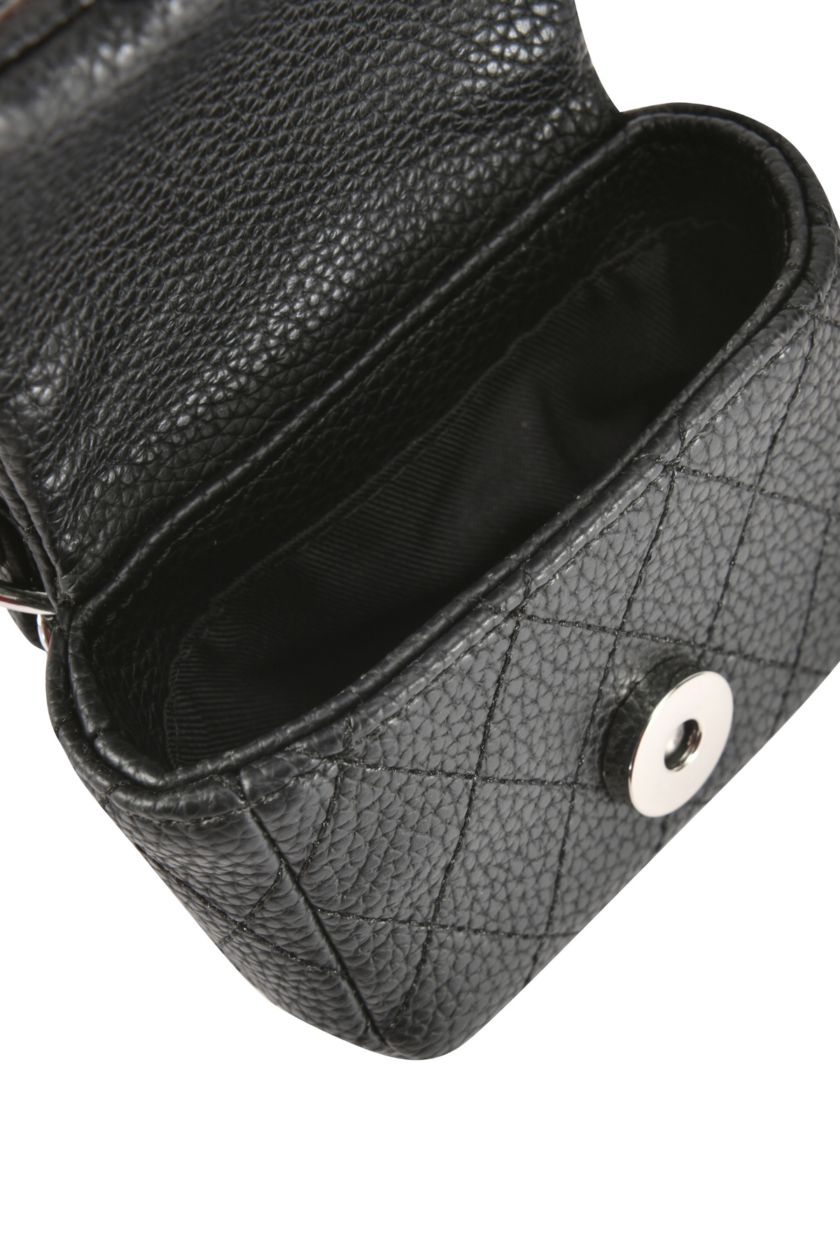 I.AM.GIA CARRIE ANKLET PURSE - BLACK, a small, black faux leather quilted mini bag with a magnetic snap closure, shown with the flap open and a silver anklet chain attached.