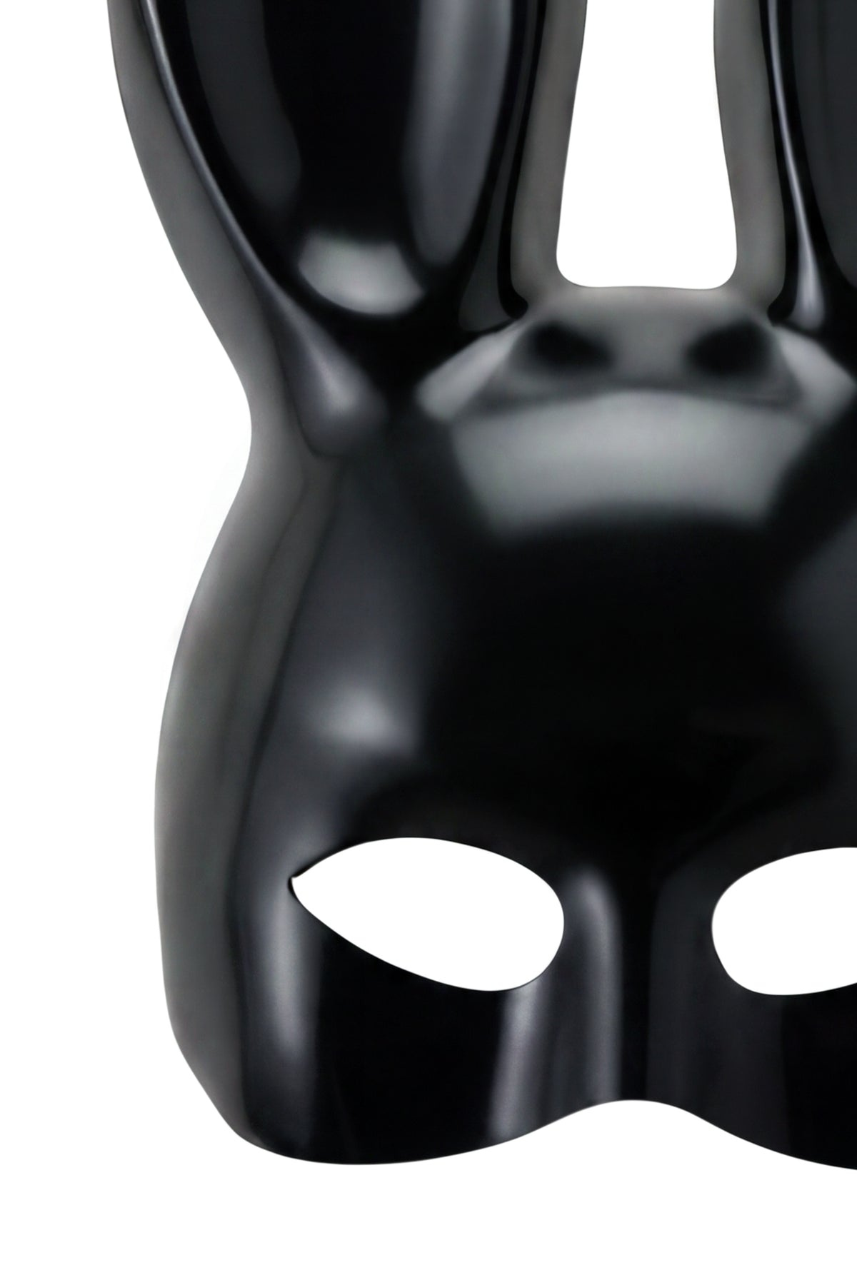 A close-up of the I.AM.GIA DOE BUNNY MASK - BLACK, featuring a glossy black finish with striking rabbit ear mask design and eye cutouts, displayed against a white background—ideal as a distinctive Halloween costume accessory.
