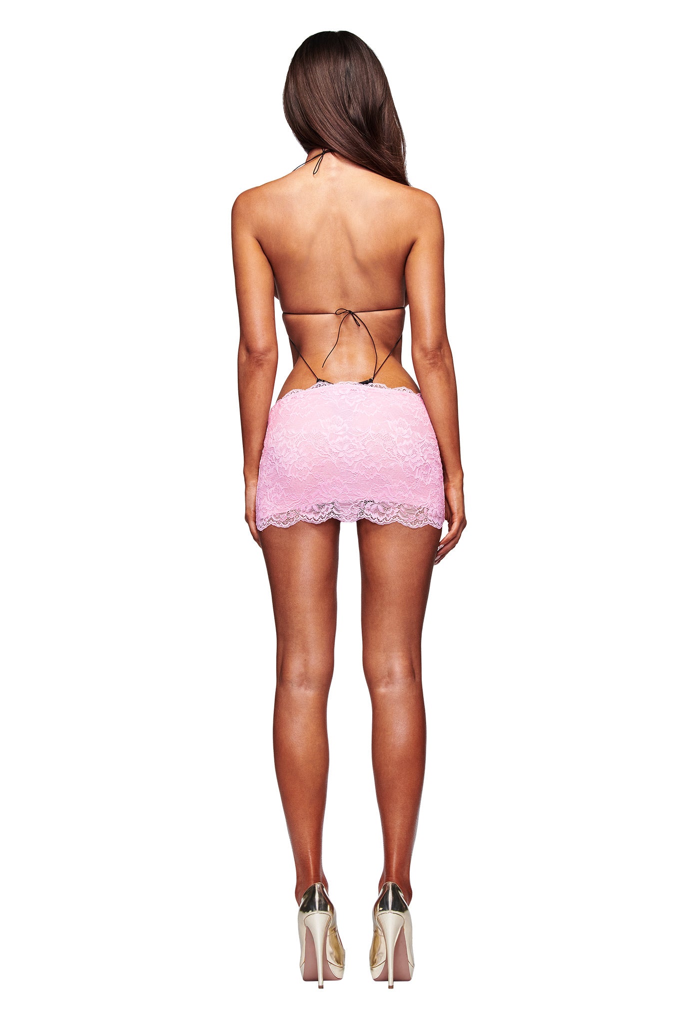 A woman faces away, wearing the I.AM.GIA AMBER LACE BODYSUIT in black. Her arms are relaxed by her sides and her long hair falls down her back, all set against a plain white background.