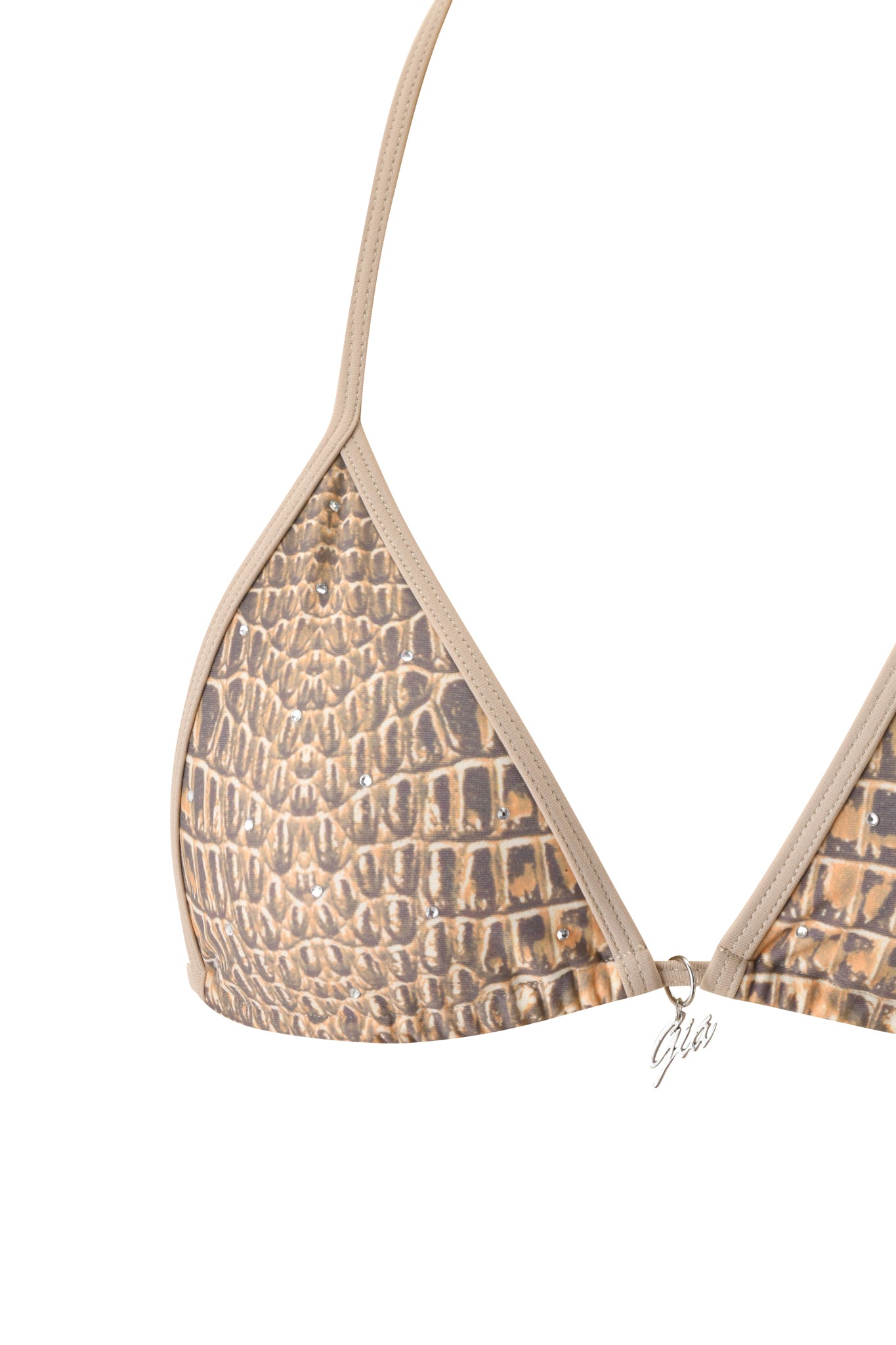 Close-up of the BABI DIAMONTE STUD BIKINI TOP - REPTILIA by I.AM.GIA, featuring a beige and brown crocodile print, thin beige straps, and a metallic "Gio" charm on the front.