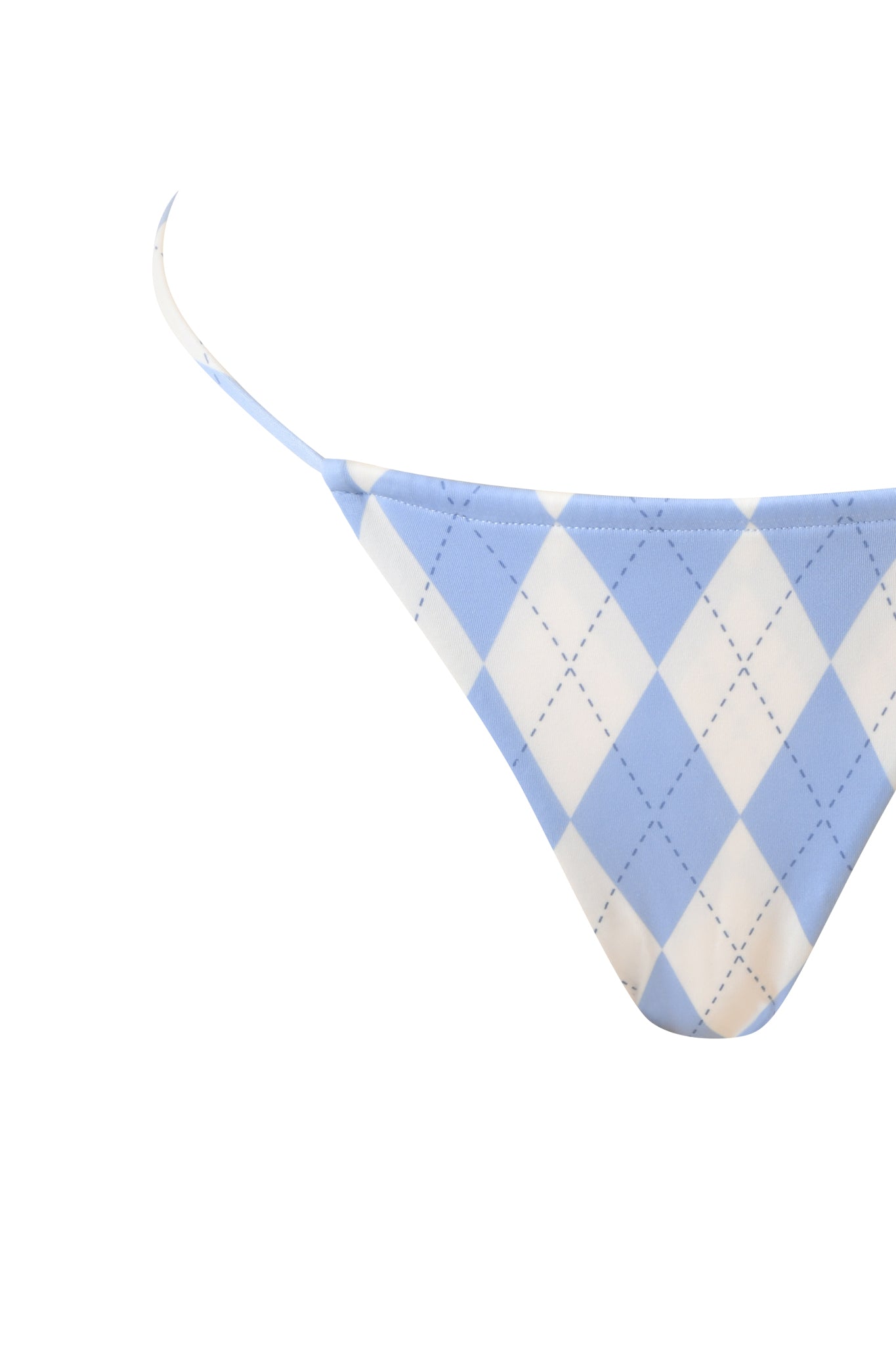 A close-up of the I.AM.GIA BRITT BIKINI BOTTOM in blue argyle with thin side straps, shown on a white background.