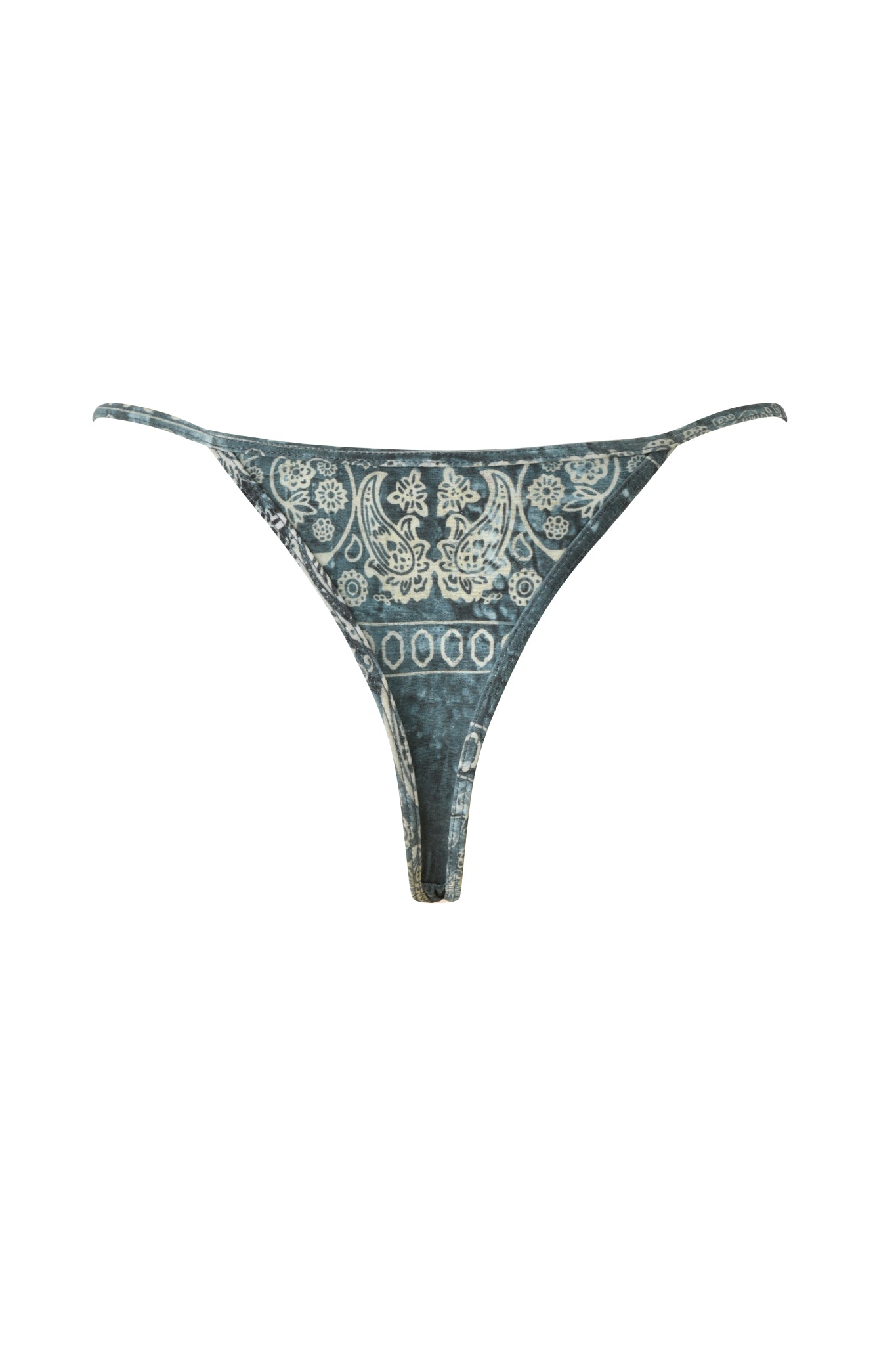 The I.AM.GIA T-REX AVA BIKINI BOTTOM - BLUE BANDANA features a blue and white thong silhouette with floral and geometric patterns inspired by classic Blue Bandana designs, shown laid flat on a white background.