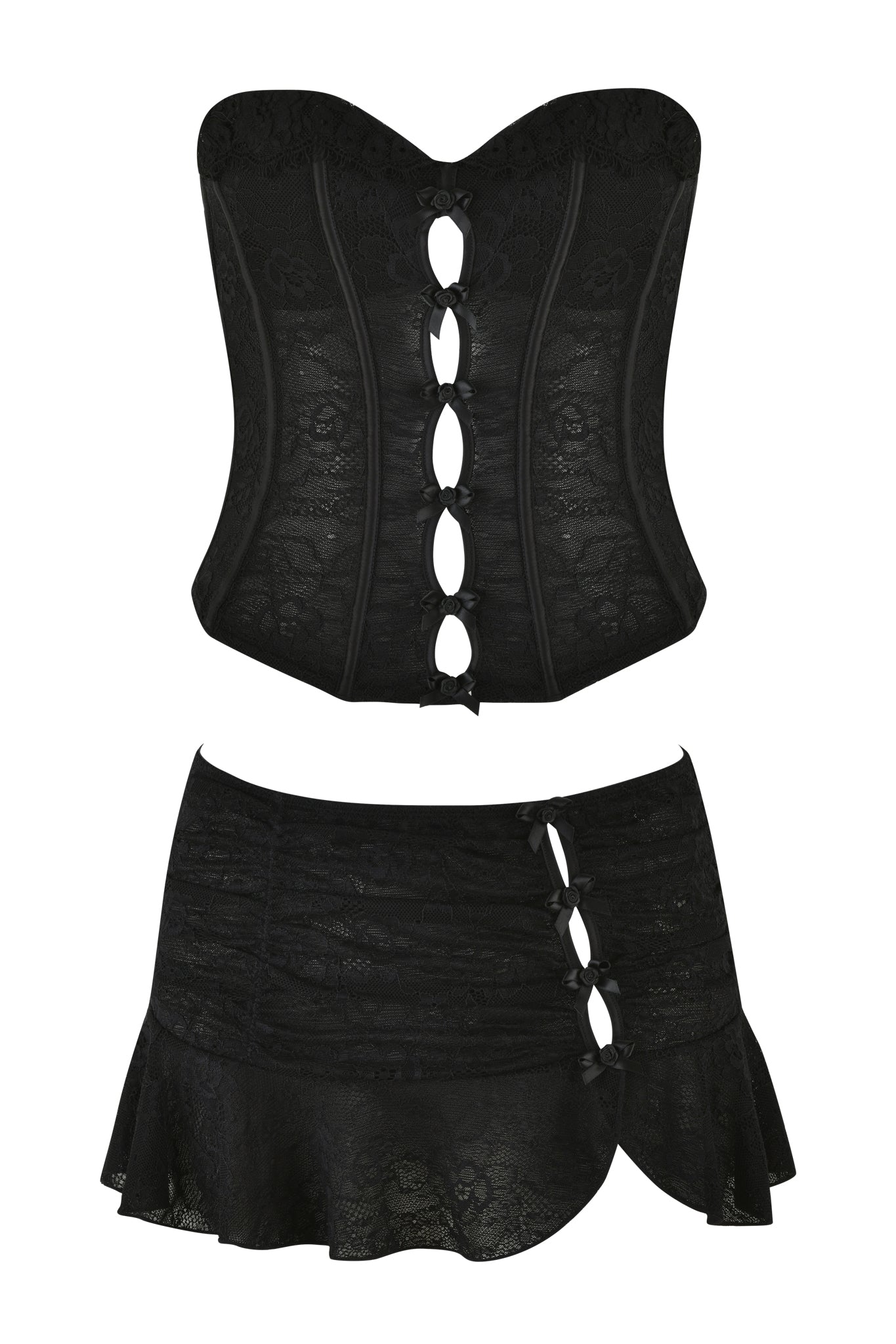 The ANNA BUSTIER SET - BLACK by I.AM.GIA includes a sophisticated black lace strapless bustier with intricate corset detailing and cutouts, paired with a micro mini skirt featuring bow adornments and a flared hem.