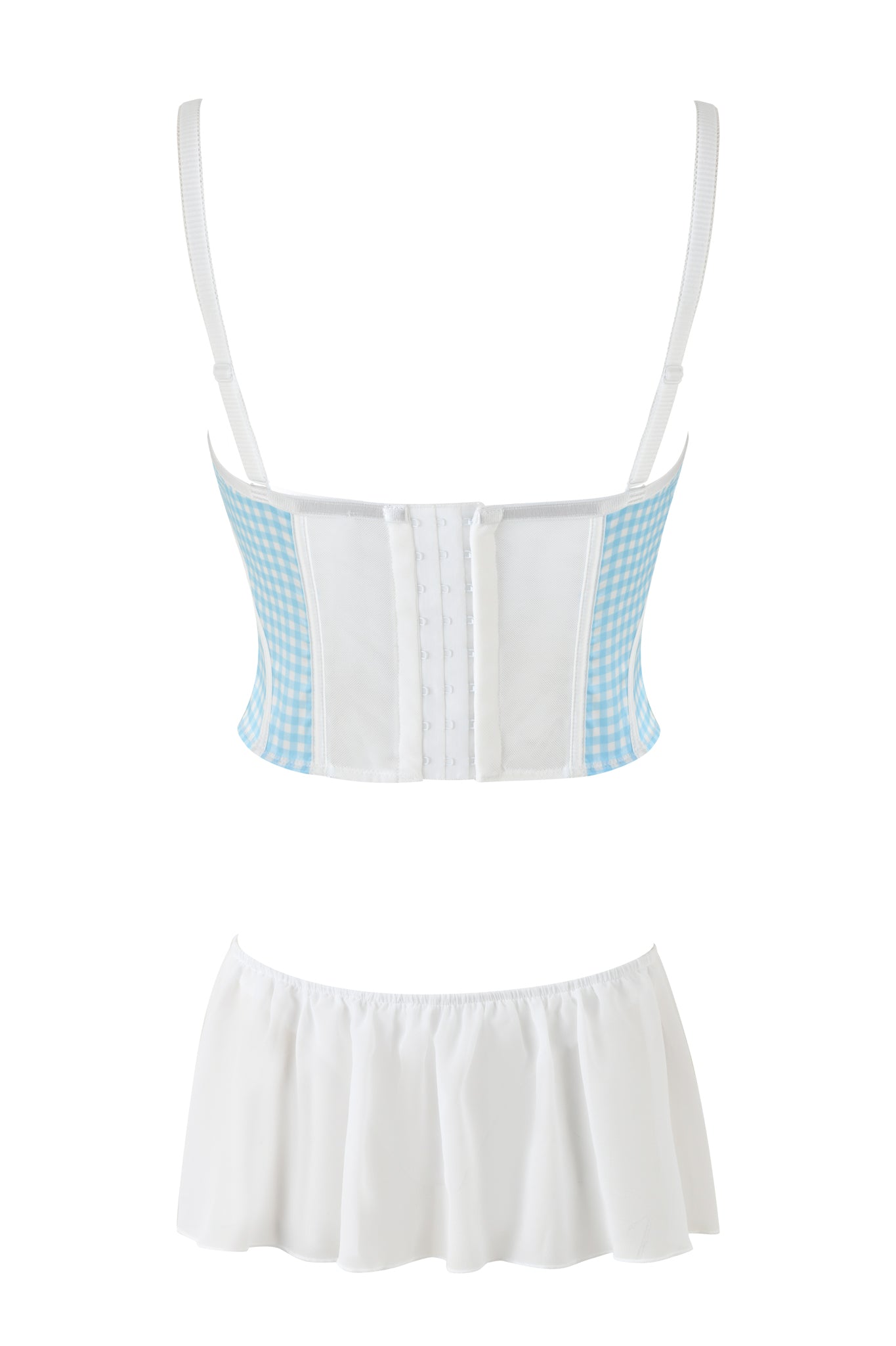 The image features the JENNY BUSTIER SET - BLUE : CHECK : GINGHAM by I.AM.GIA, highlighting a white and light blue checkered bustier with adjustable straps and hook-and-eye closures at the back, reminiscent of Dorothy-inspired lingerie. The set also includes a matching white mini skirt with a flared hem, all showcased against a plain white background.
