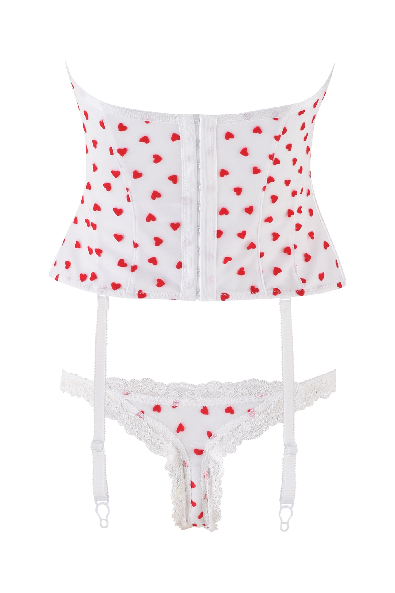 The PAMELA SET - WHITE : HEARTBEAT by I.AM.GIA includes a vintage-inspired bustier with red heart flocked tulle and adjustable, removable garter straps, paired with lace-trimmed panties. The elegant set is displayed on a plain white background.