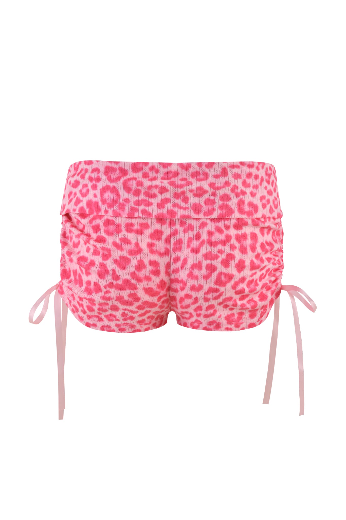 The MIA SHORT - PINK LEOPARD from I.AM.GIA showcases a low-rise waist and is adorned with a pink and white leopard pattern, complemented by chic side ties, and displayed against a crisp white backdrop.
