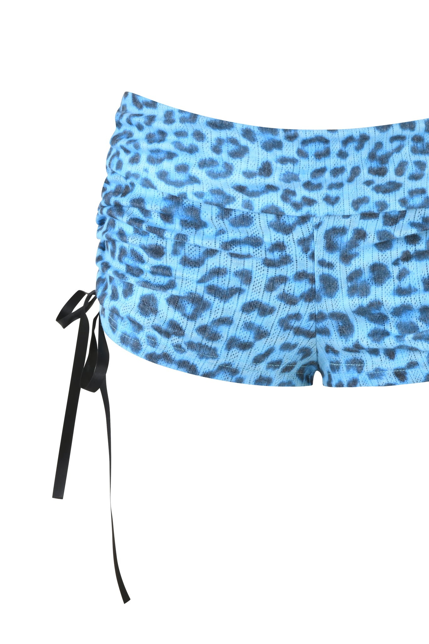 Close-up of the I.AM.GIA MIA SHORT - TEAL LEOPARD: low-rise mini shorts with ruched sides and a black ribbon tie on the left, shown in a bold teal leopard print.