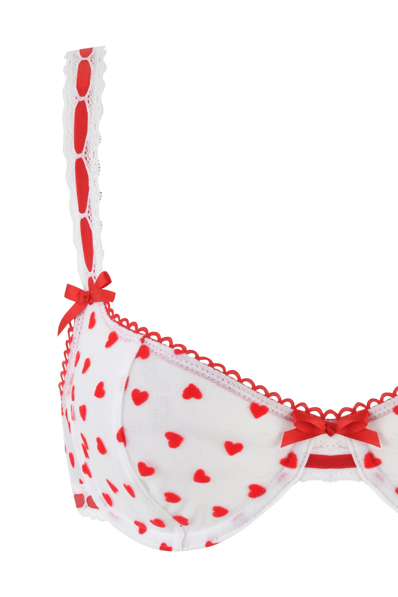The ROMY 2 PIECE SET - WHITE : HEARTBEAT by I.AM.GIA is a vintage-inspired bra featuring red hearts, decorative red bows on adjustable elastic straps, and scalloped lace trim for added detail.