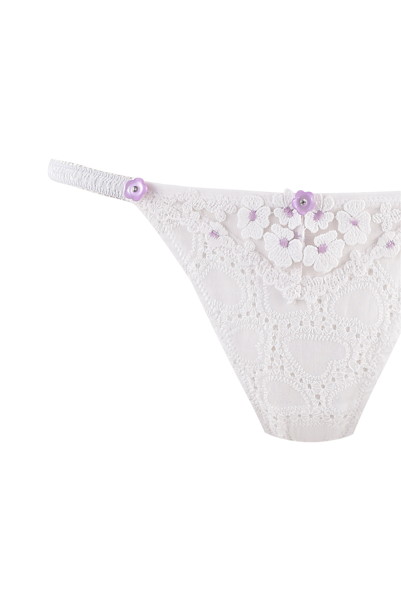 A close-up of the I.AM.GIA ELLA BUSTIER SET in white, featuring floral embroidery and small purple decorative buttons on the waistband.